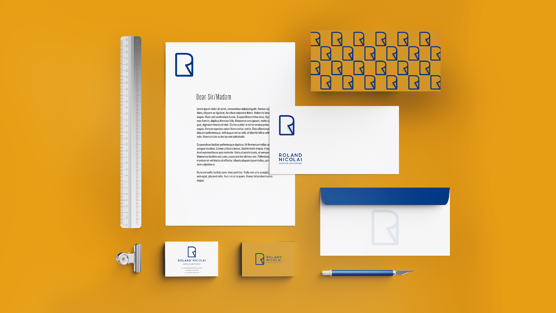 Selection-of-stationary-branded-with-Roland-Nicolai-brand-identity.png
