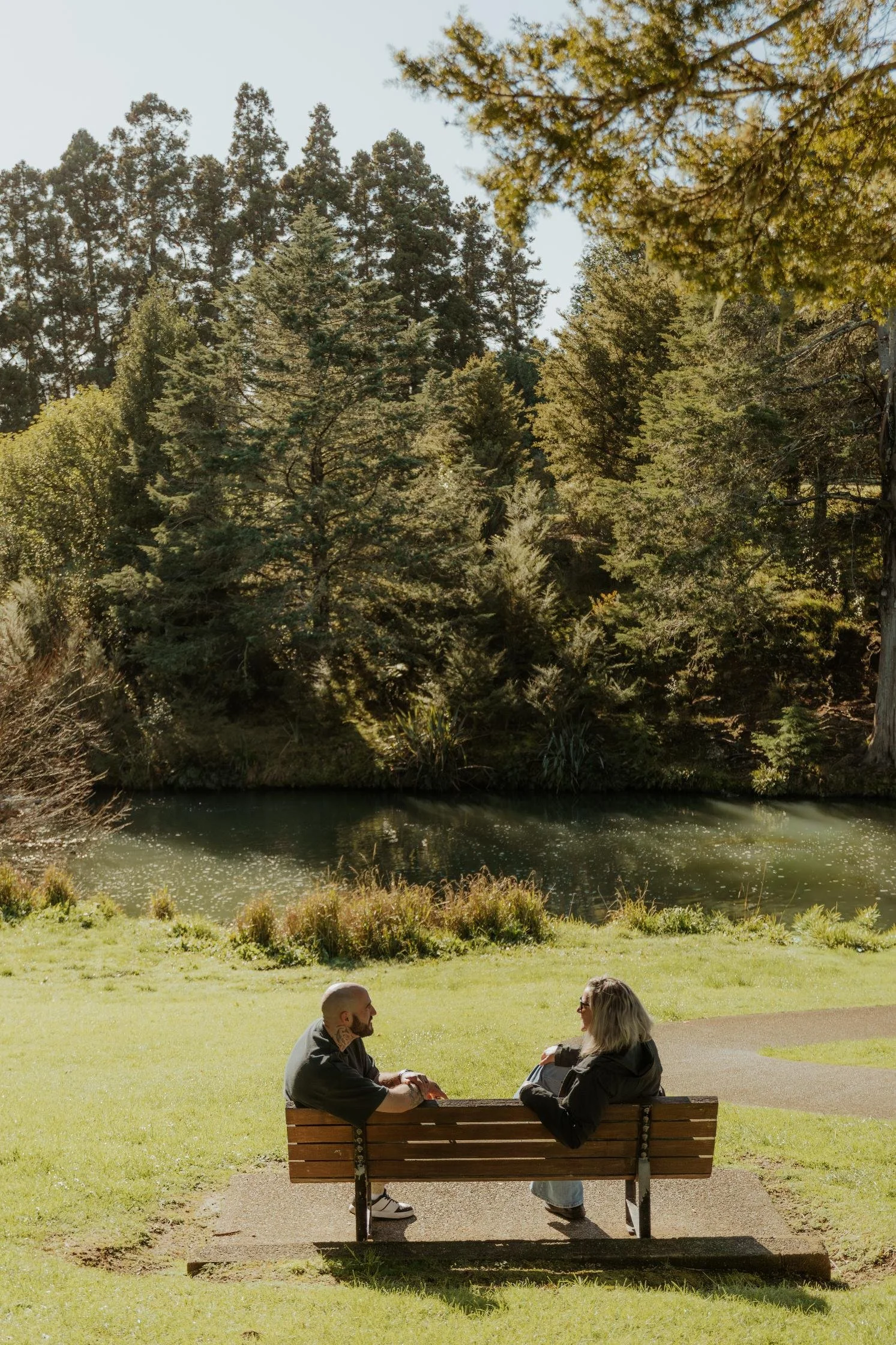 Counsellor and participant sitting together reflecting on the walk-and-talk session.