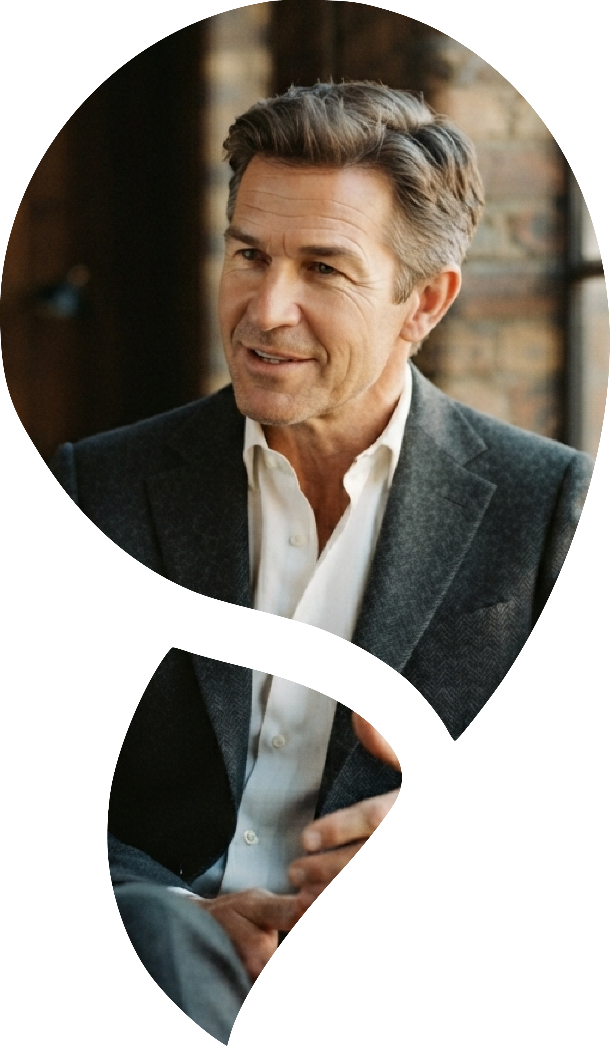 Professional man in a blazer, representing thoughtful leadership and executive coaching.