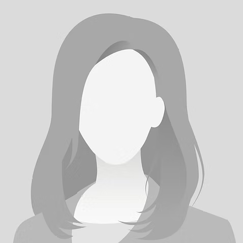 Silhouette of a woman's head and shoulders against a gray background.