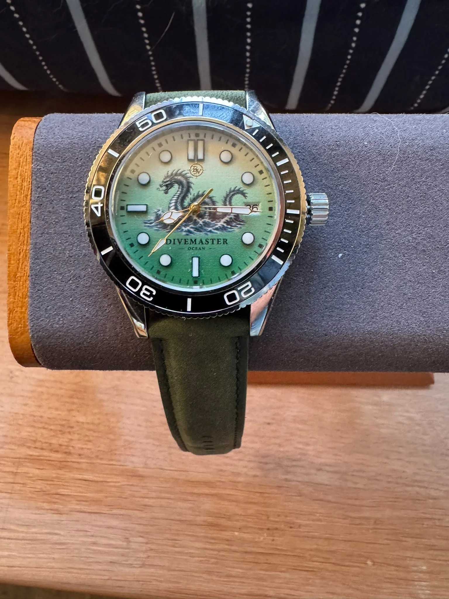Divemaster Ocean: Nh35 movement with 31mm custom dial and green fabric strap, in a Stainless steel diver style case with rotating bezel. This was the prototype build, hence not suitable for sale