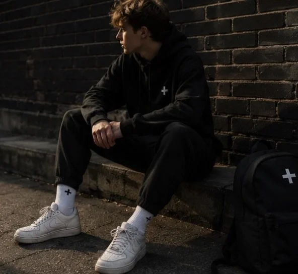 Everyone in my year is finding out today what a piece of paper thinks of them.

I&rsquo;m 16. I started a clothing brand instead of waiting to be told what I&rsquo;m allowed to do next.

The plus isn&rsquo;t a logo. It&rsquo;s the bit you add after t