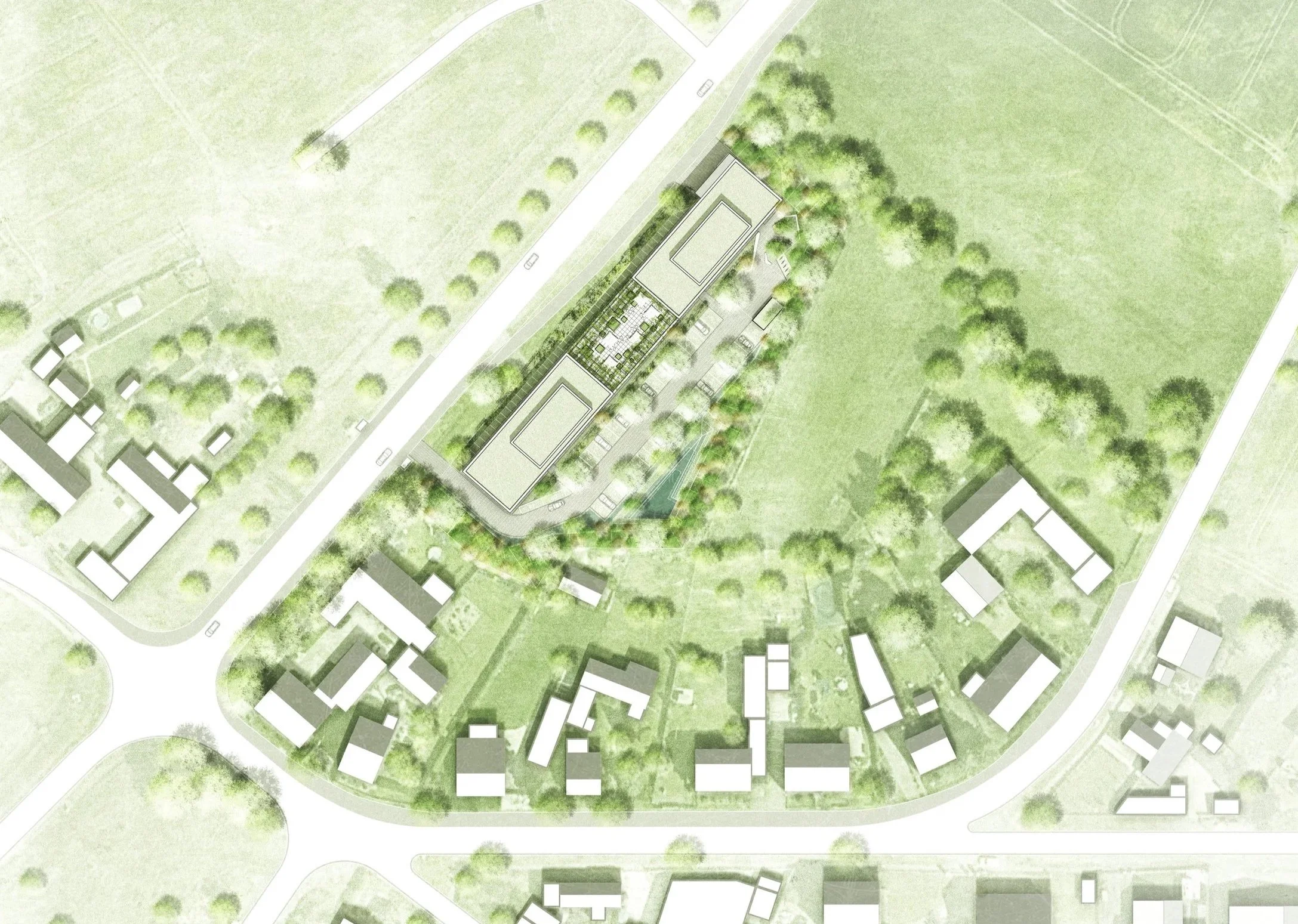 Luftaufnahme eines Plans mit Gebäuden, Straßen und viel Grün, möglicherweise ein architektonisches oder städtebauliches Konzept.