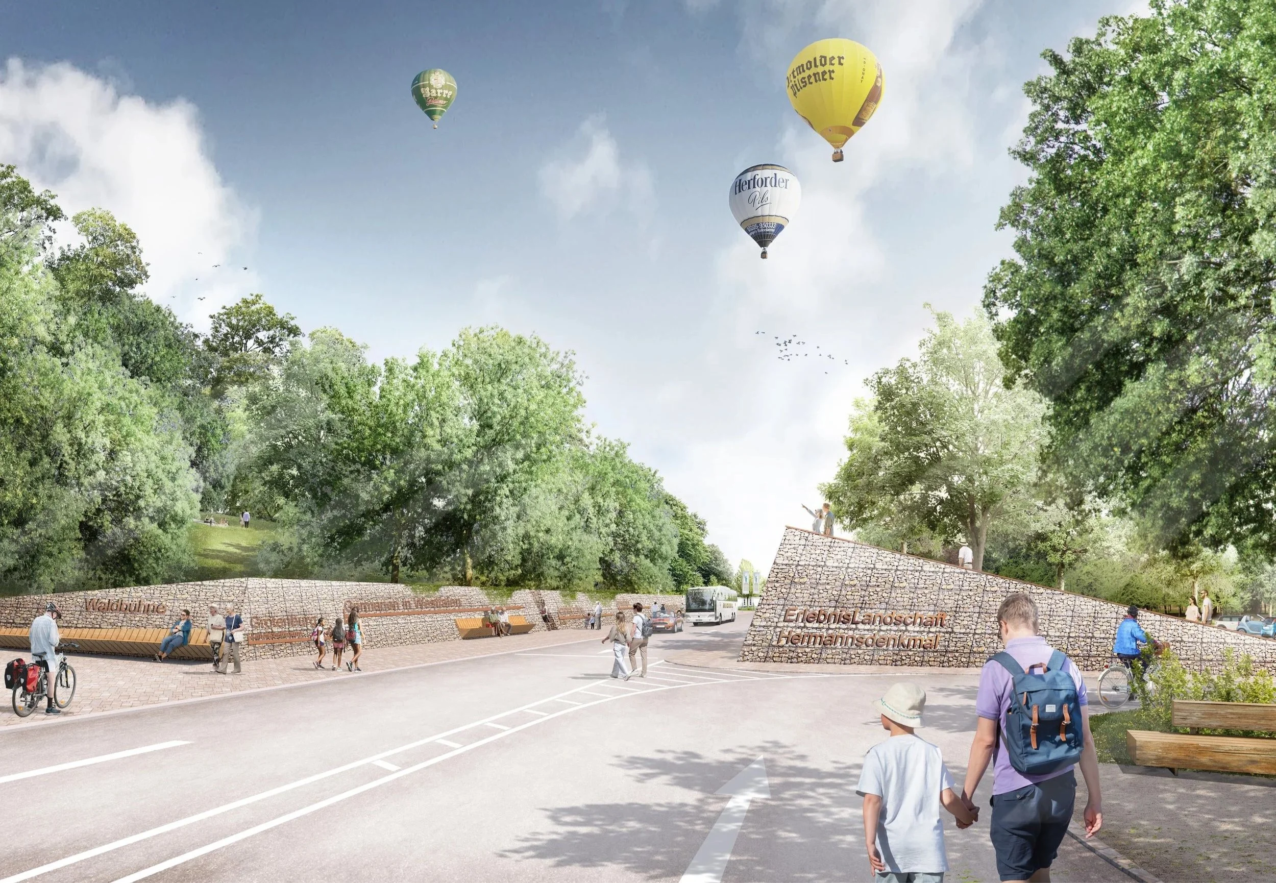 Menschen gehen in einem Park bei den Erlebnislandschaften Hemmendingen vorbei, im Hintergrund sind Heißluftballons am Himmel zu sehen, umgeben von grünen Bäumen.