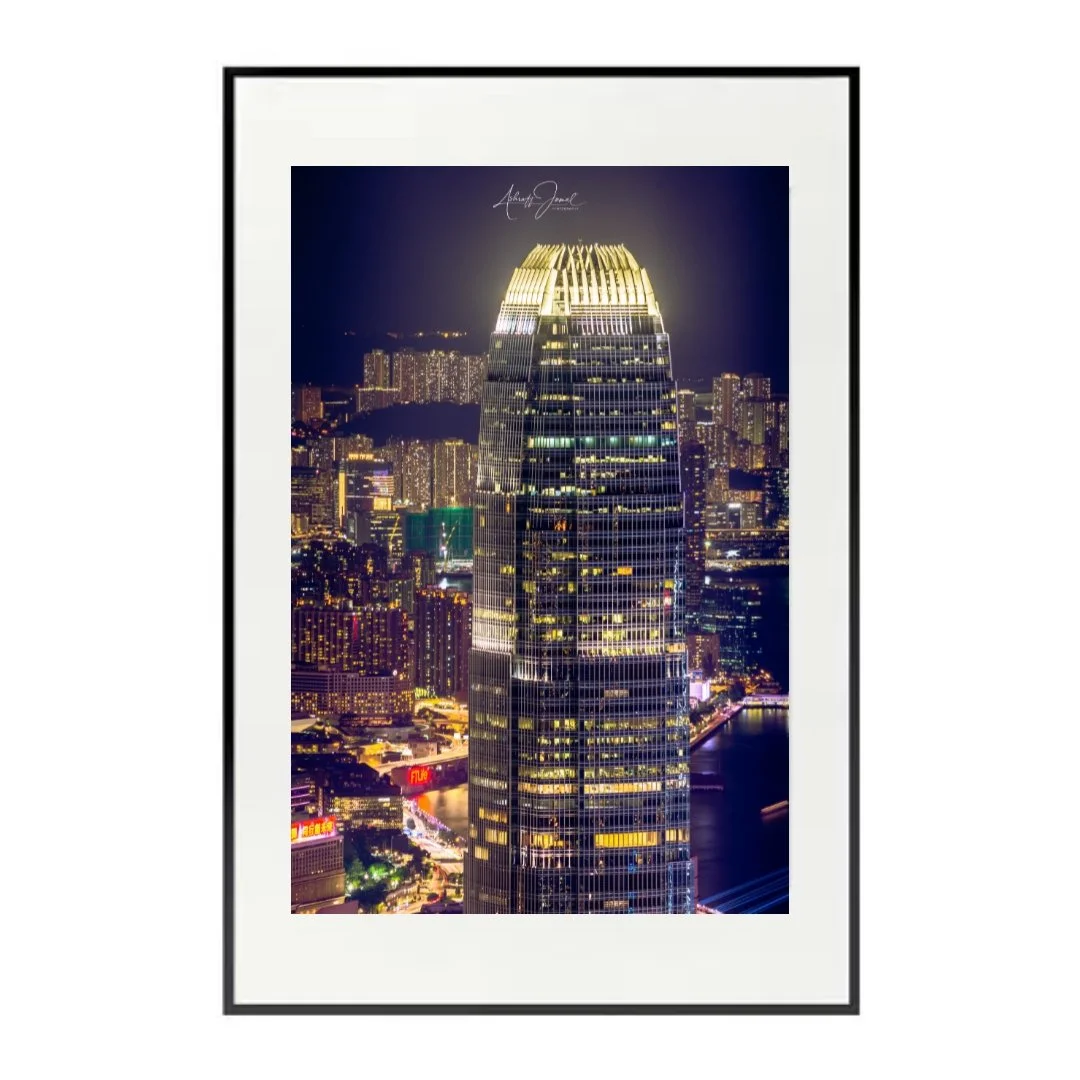 Hong Kong 2 IFC skyline night print in a black frame.