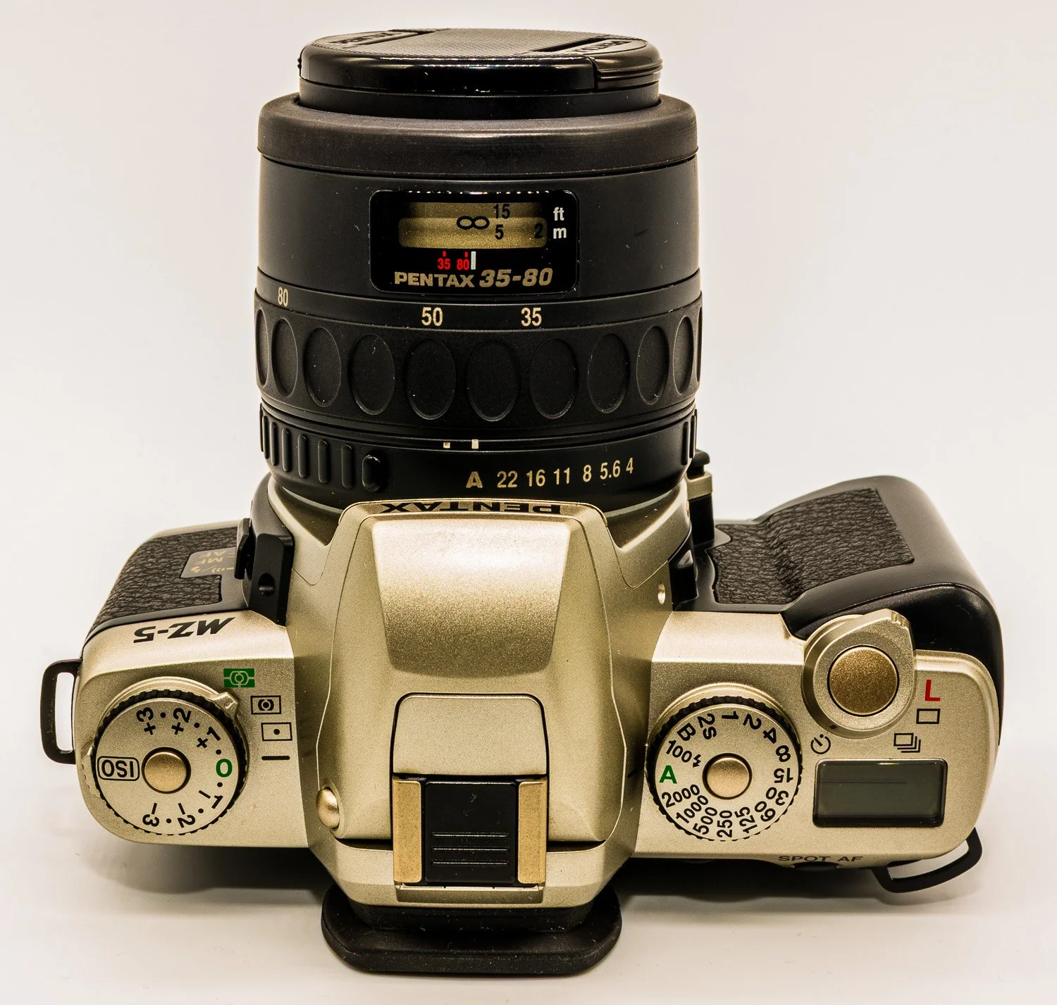Vintage silver Pentax film camera with a 35-80mm zoom lens used by Ashraff Jamal Photography.