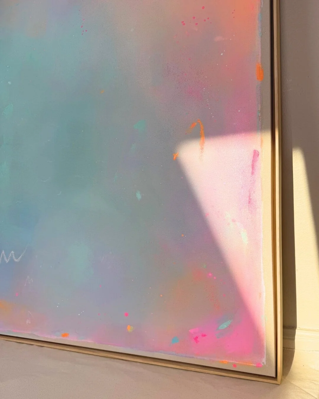 close up Atmospheric abstract landscape depicting a sunrise, featuring a radiant orange sun set against a soft-gradient background of turquoise, green, and pink by Vanessa Ochi
