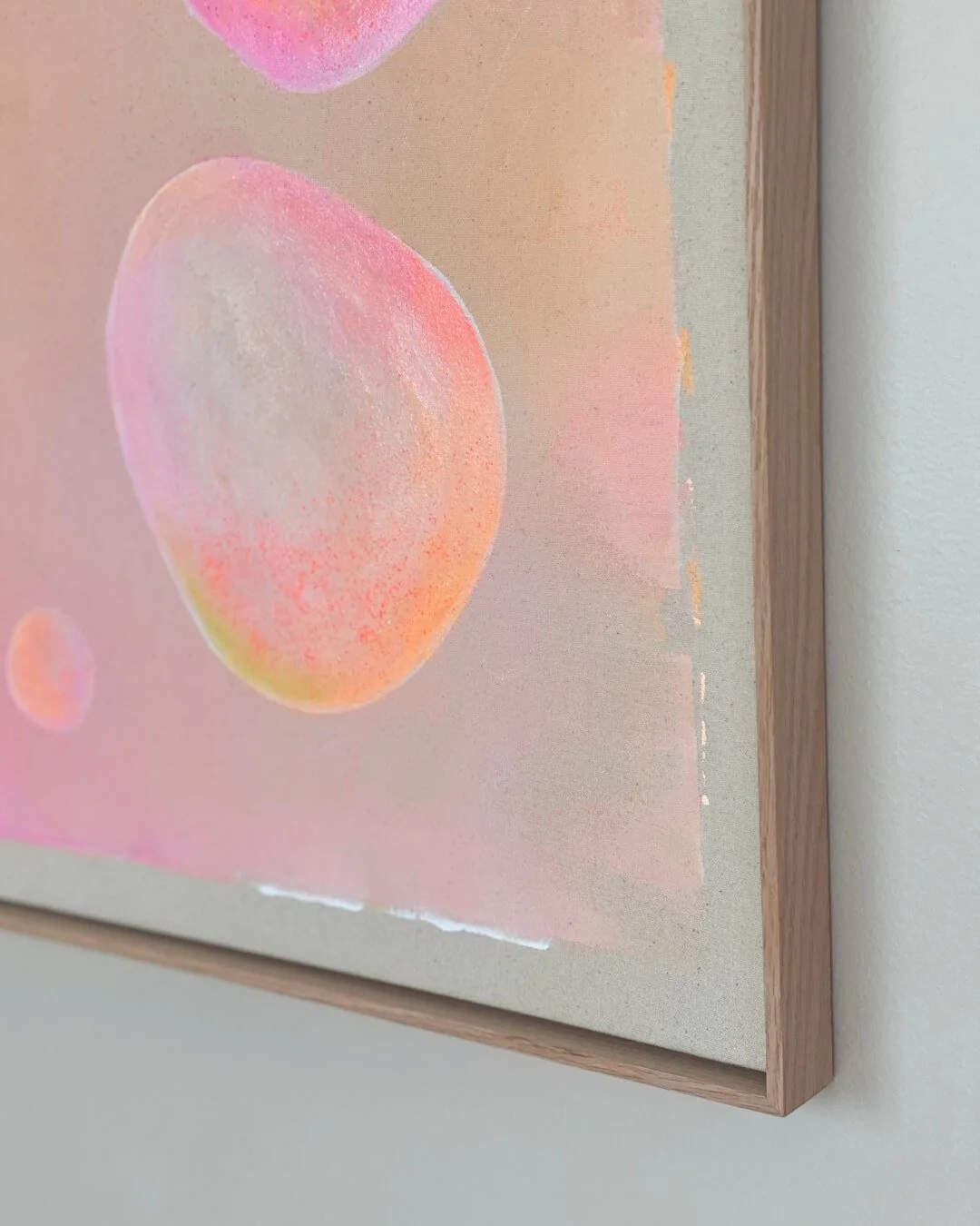 Side view of a section of the "Dream Bubble" artwork. The image features pink and orange bubbles against a beige-orange background.