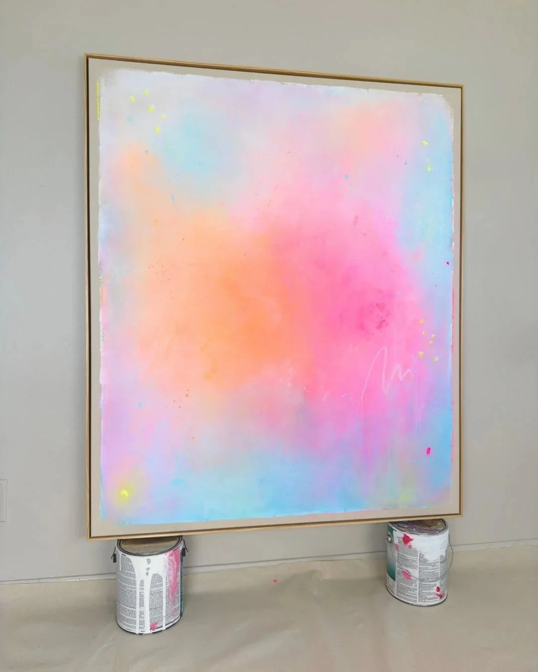 Full front shot of the abstract artwork Bloom in Waterlight, depicting soft, fluid color transitions of coral and rose on a turquoise surface by Vanessa Ochi