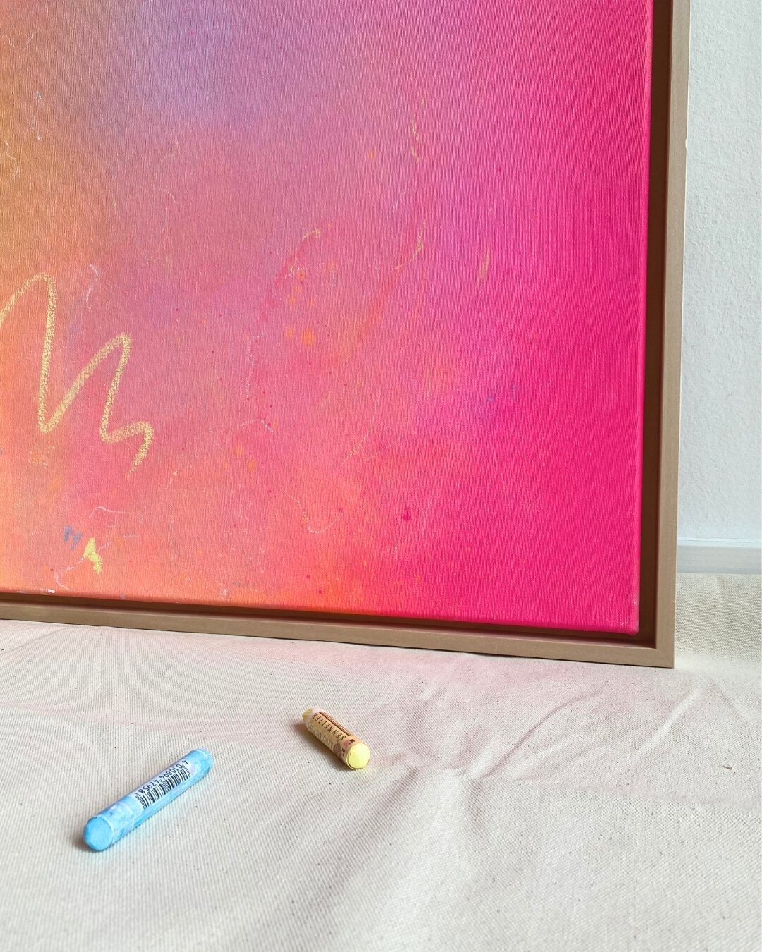 gradient artwork in pink, blue, orange an yellow