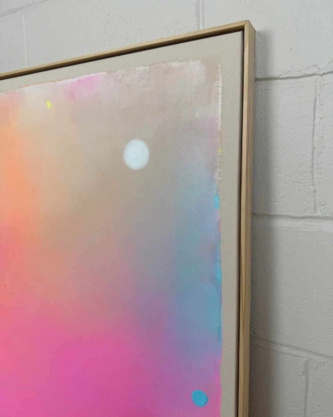 A close-up shot of an artwork from the *Michigan Sun* series in pink, orange and blue