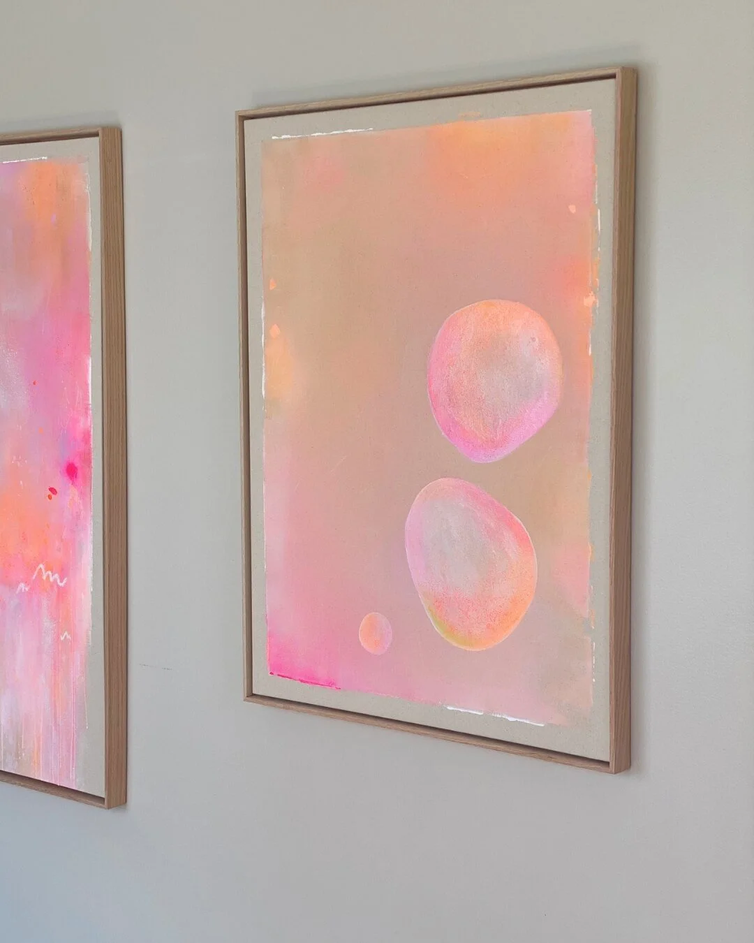 Original abstract painting featuring colorful floating bubbles with soft gradients of beige, gentle pink, and radiant orange by Vanessa Ochi.