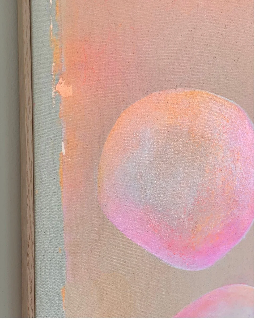 Side view of a section of the "Dream Bubble" artwork. The image features pink and orange bubbles against a beige-orange background.