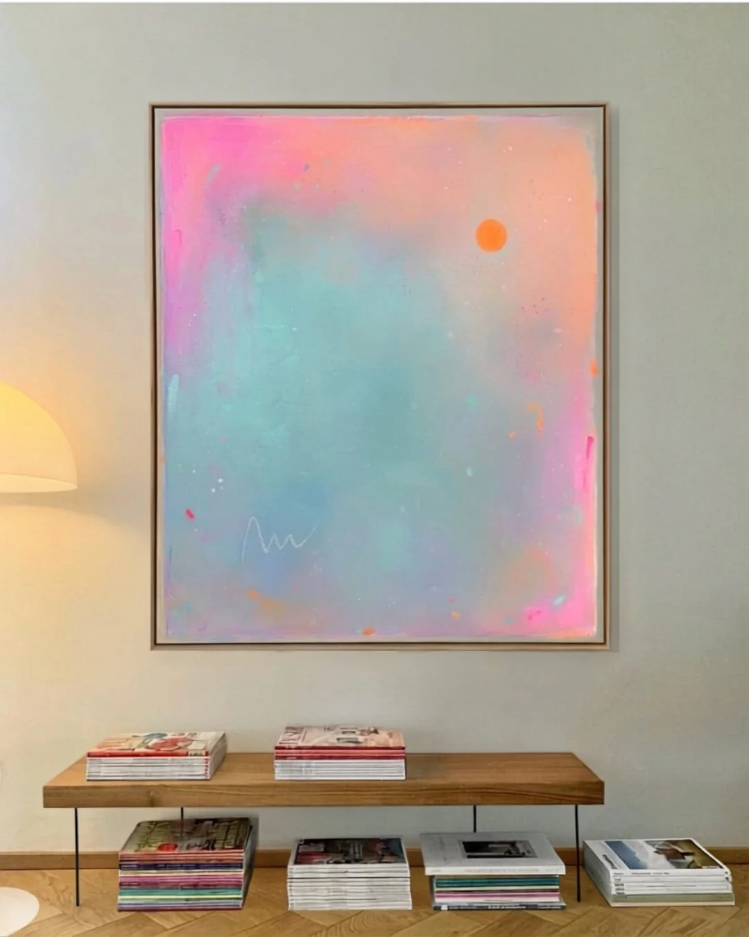 Atmospheric abstract landscape depicting a sunrise, featuring a radiant orange sun set against a soft-gradient background of turquoise, green, and pink by Vanessa Ochi