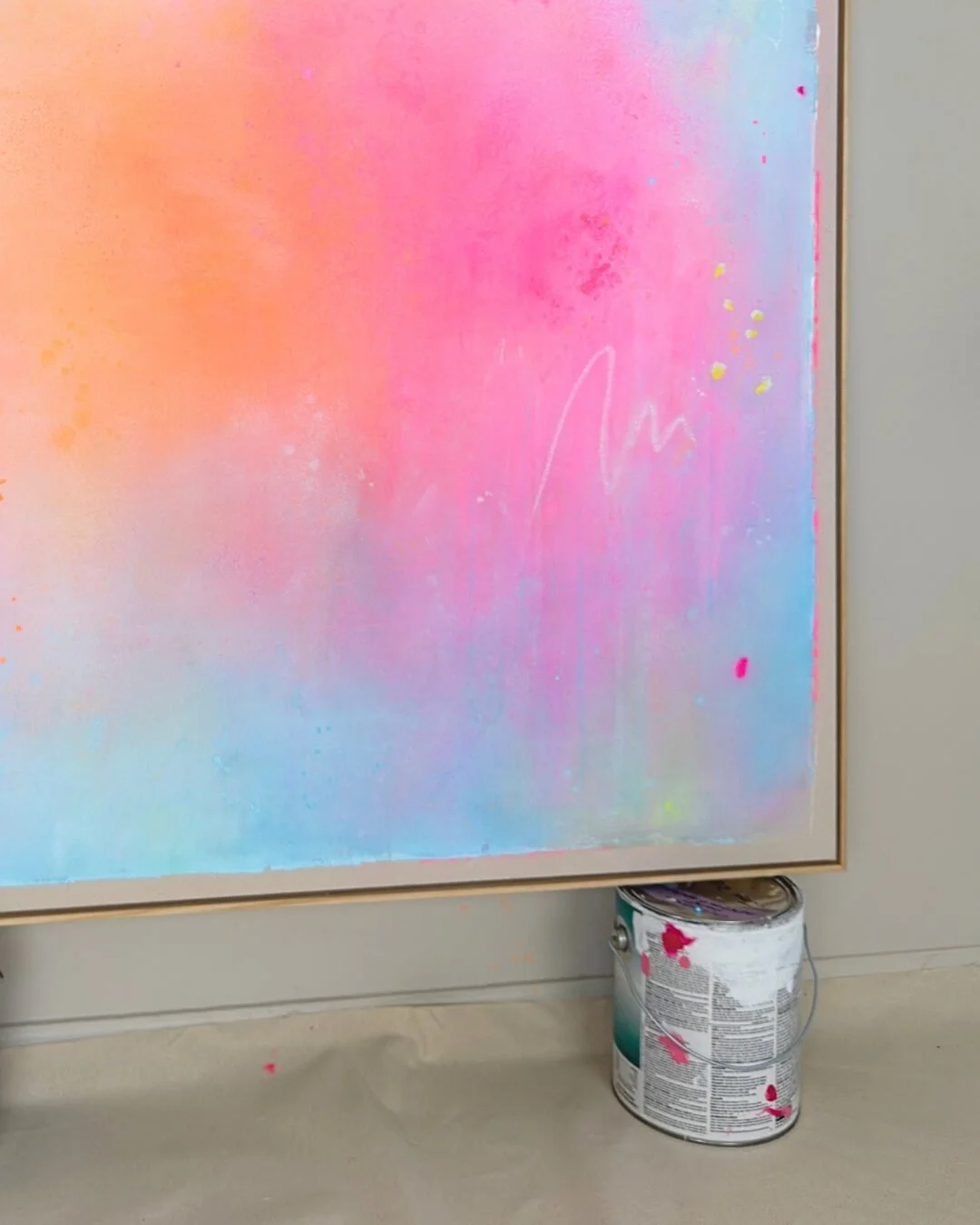Close-up detail of smooth paint transitions and fluid color blending in warm pink, orange, and soft turquoise from Bloom in Waterlight by Vanessa Ochi