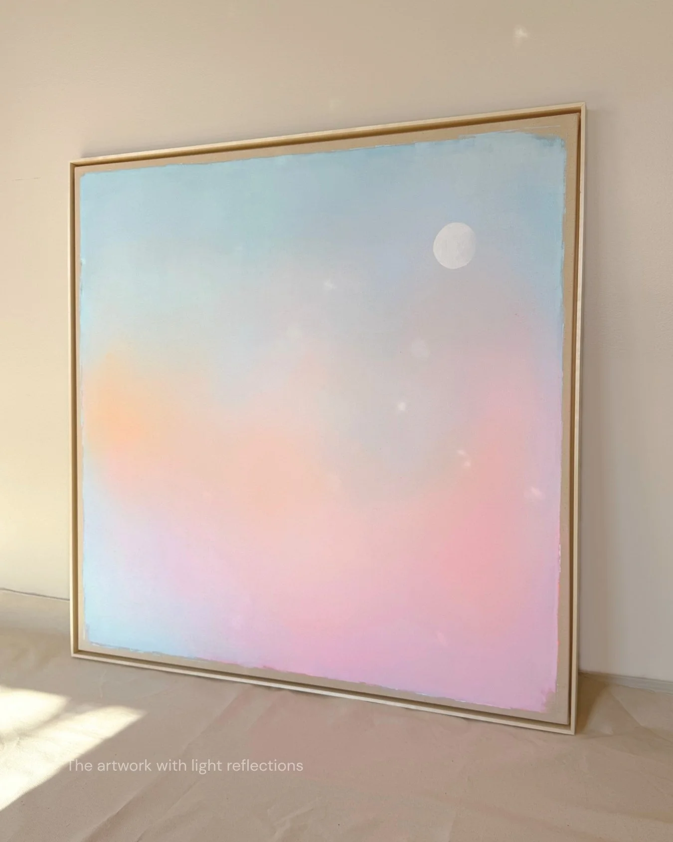 Large abstract canvas art depicting a dreamy atmospheric sky with seamless transitions of pastel blue, soft pink, and warm orange by Vanessa Ochi