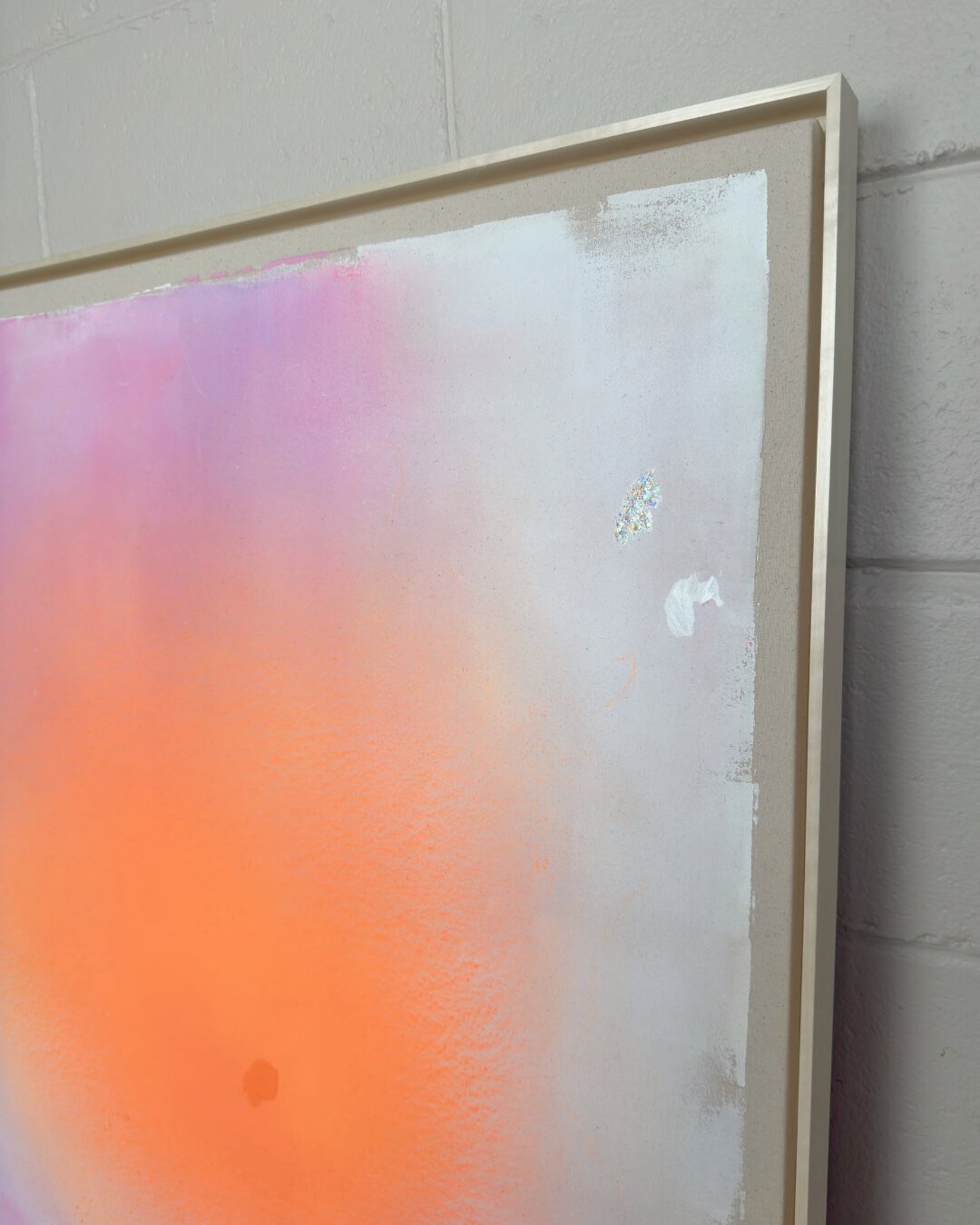 Close-up detail of subtle glitter accents and smooth pink and orange color blending from the Michigan Sun series by Vanessa Ochi