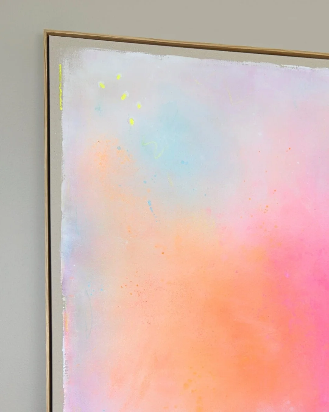 Close-up detail of smooth paint transitions and fluid color blending in warm pink, orange, and soft turquoise from Bloom in Waterlight by Vanessa Ochi