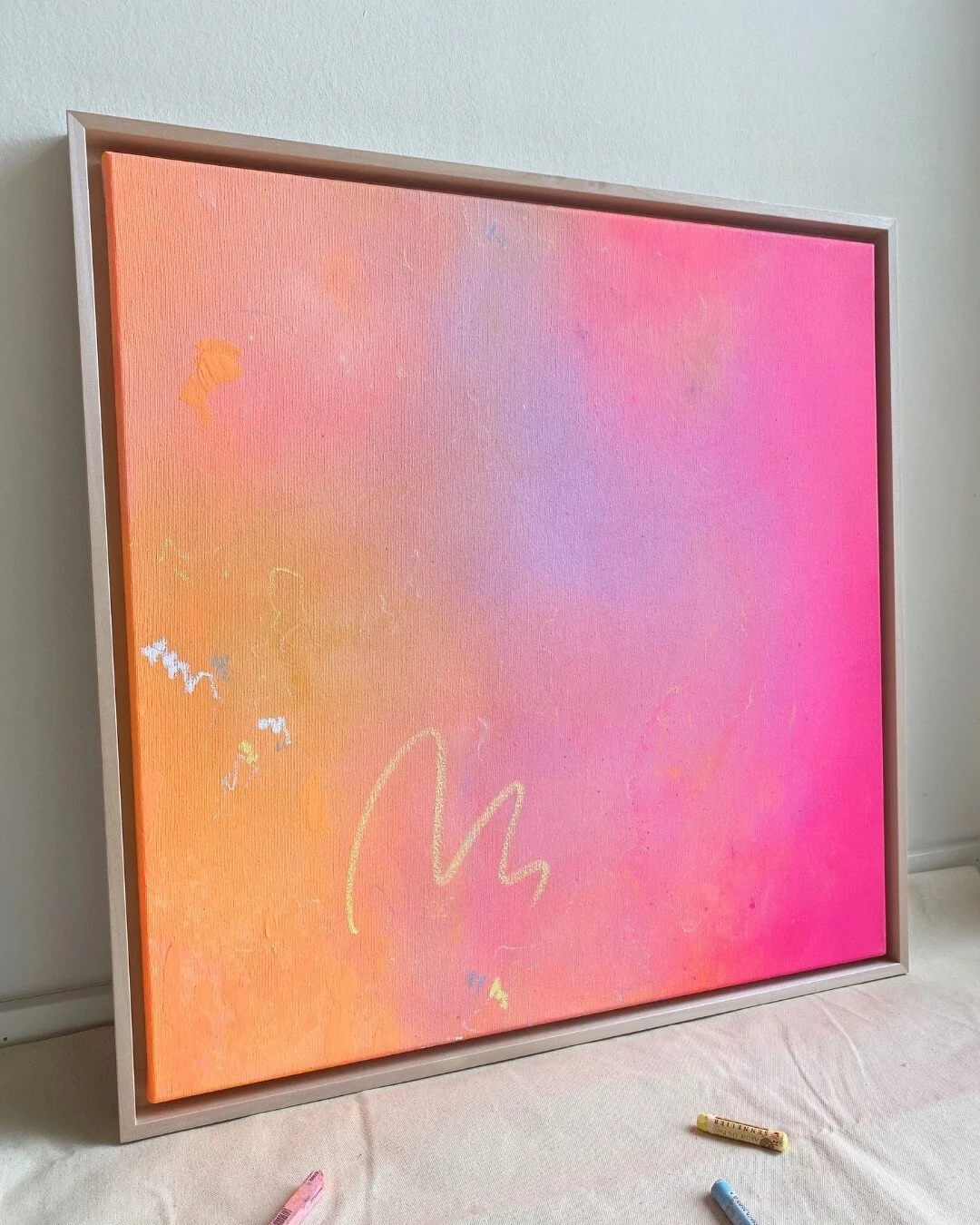 gradient artwork in pink, blue, orange an yellow