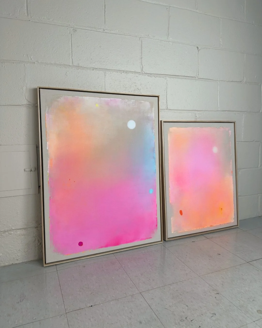 Original abstract painting featuring a holographic (holo) effect full moon against a dreamy gradient sky of warm pink, orange, and soft blue by Vanessa Ochi.