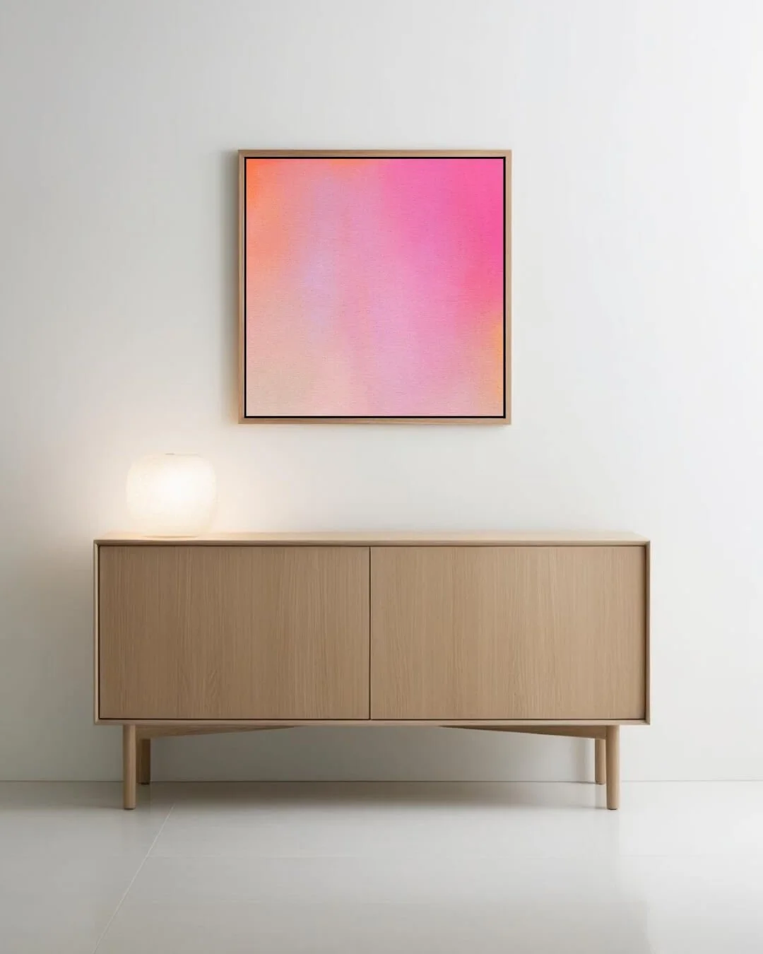 wall and sideboard with artwork