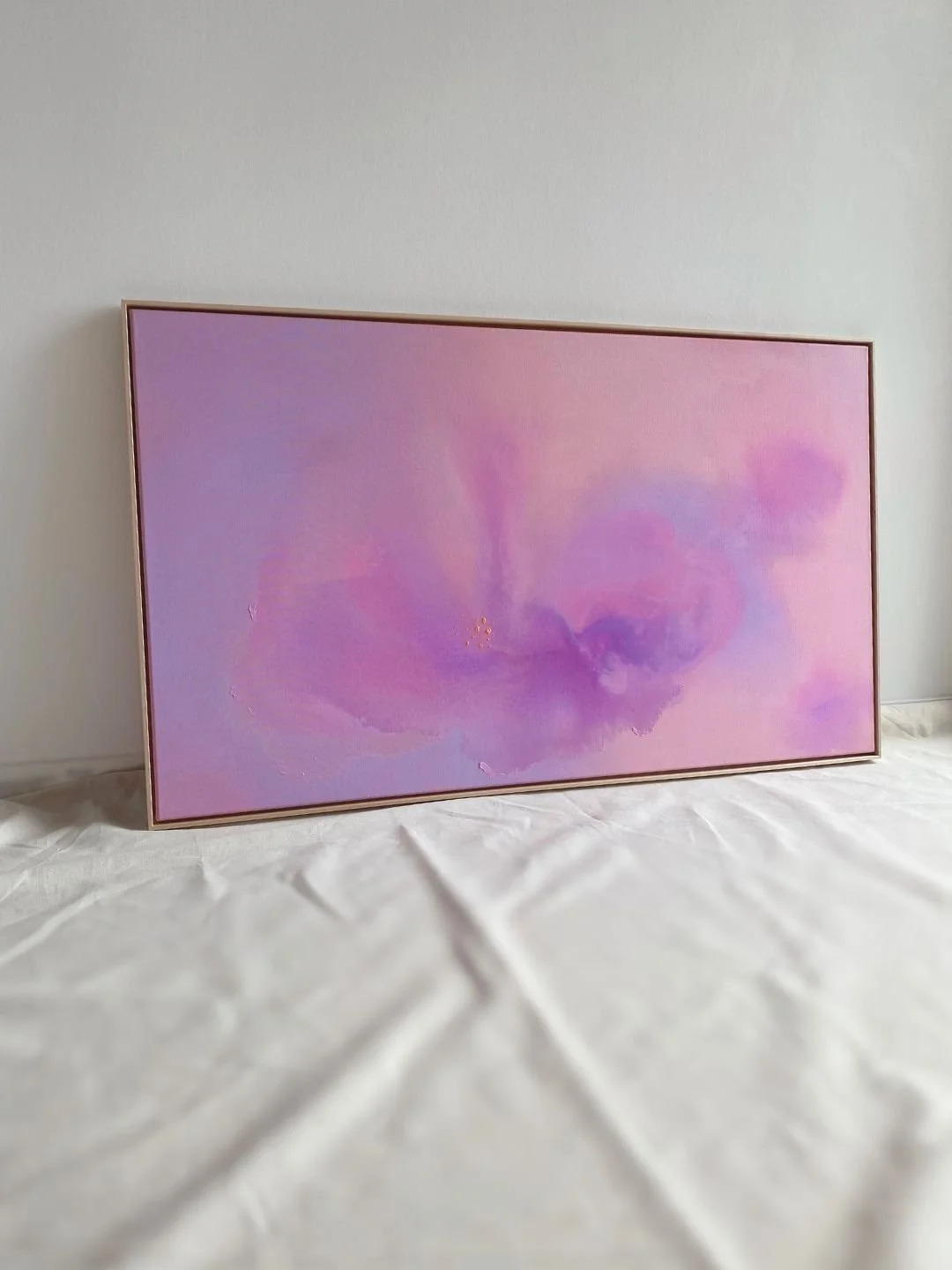 Atmospheric pastel abstract painting showcasing a soothing blend of purple, lilac, and soft rose tones by Vanessa Ochi.