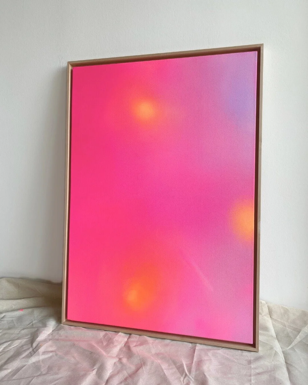 Expressive abstract artwork in radiant pink, lilac, and orange tones, celebrating feminine power and cosmic energy by Vanessa Ochi.