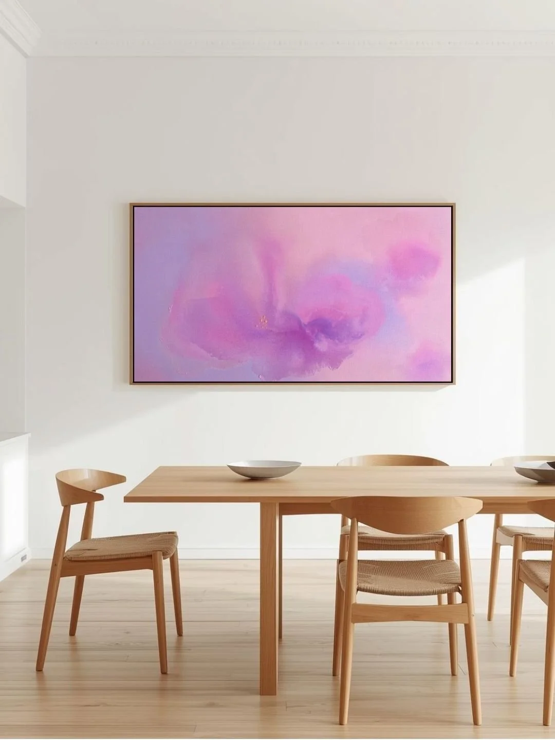Modern dinning room featuring the serene lavender and pink abstract canvas painting Soft Bloom mounted on a minimalist wall