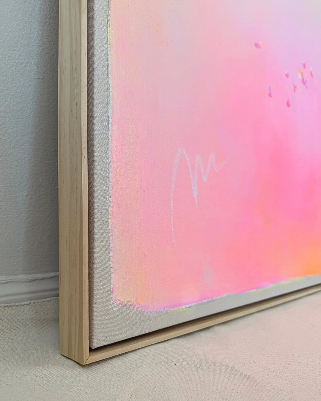 Close-up detail of subtle texture and soft pastel pink color flow from the abstract painting Summer Breeze by Vanessa Ochi.