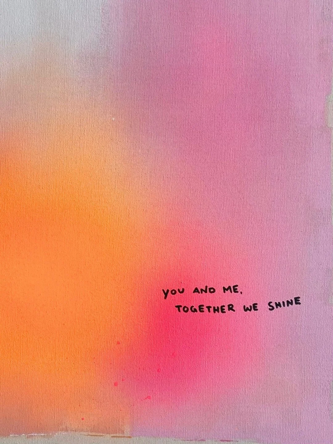 Detail shot focusing on the luminous white and warm rose-pink paint blending on canvas, symbolizing shared energy and warmth by Vanessa Ochi.
