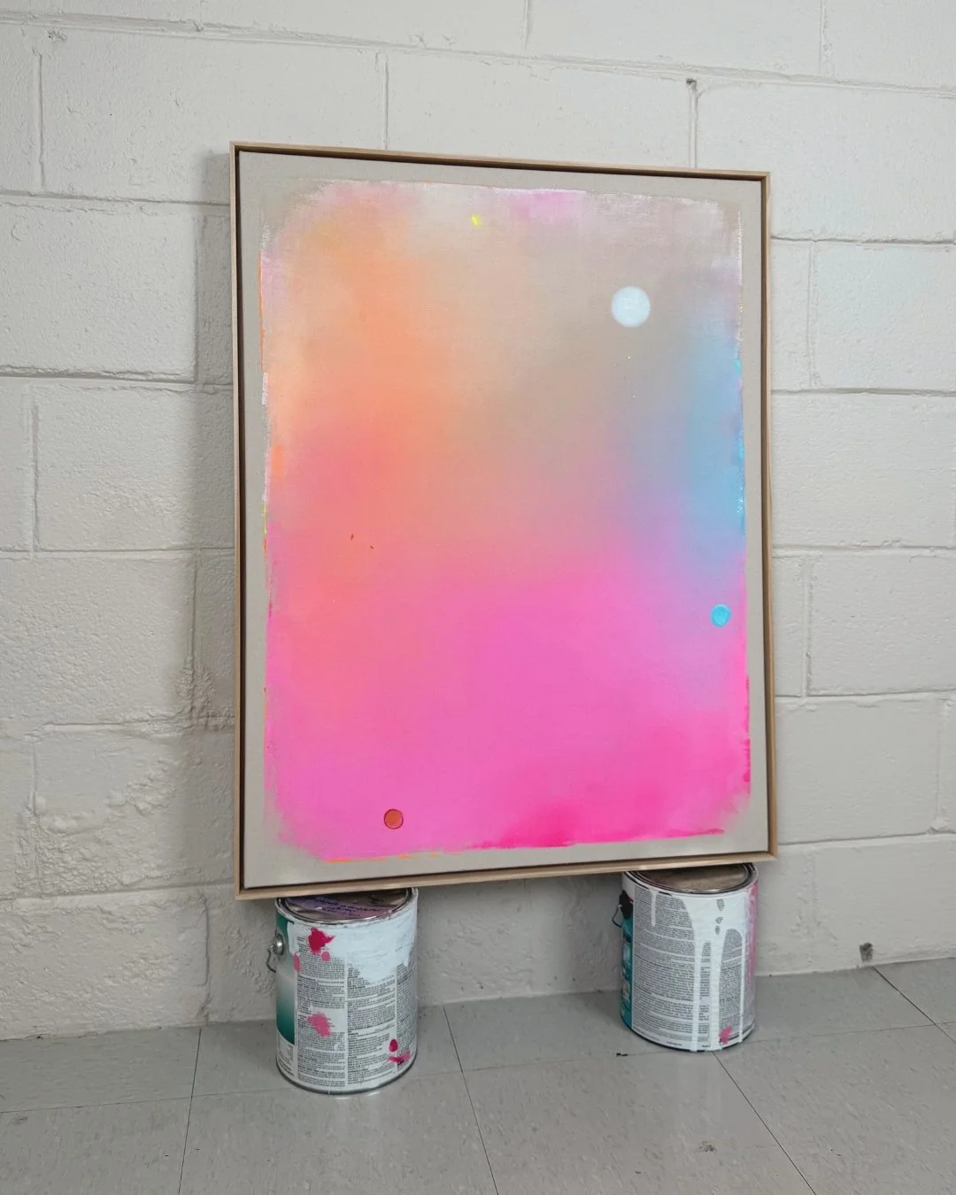 Original abstract painting featuring a holographic (holo) effect full moon against a dreamy gradient sky of warm pink, orange, and soft blue by Vanessa Ochi.