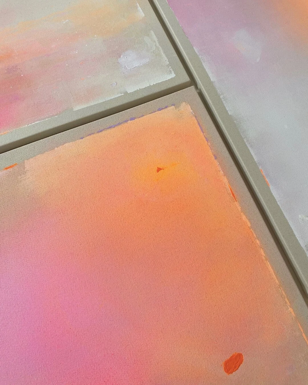 A close-up shot of an artwork from the *Michigan Sun* series in orange and pink