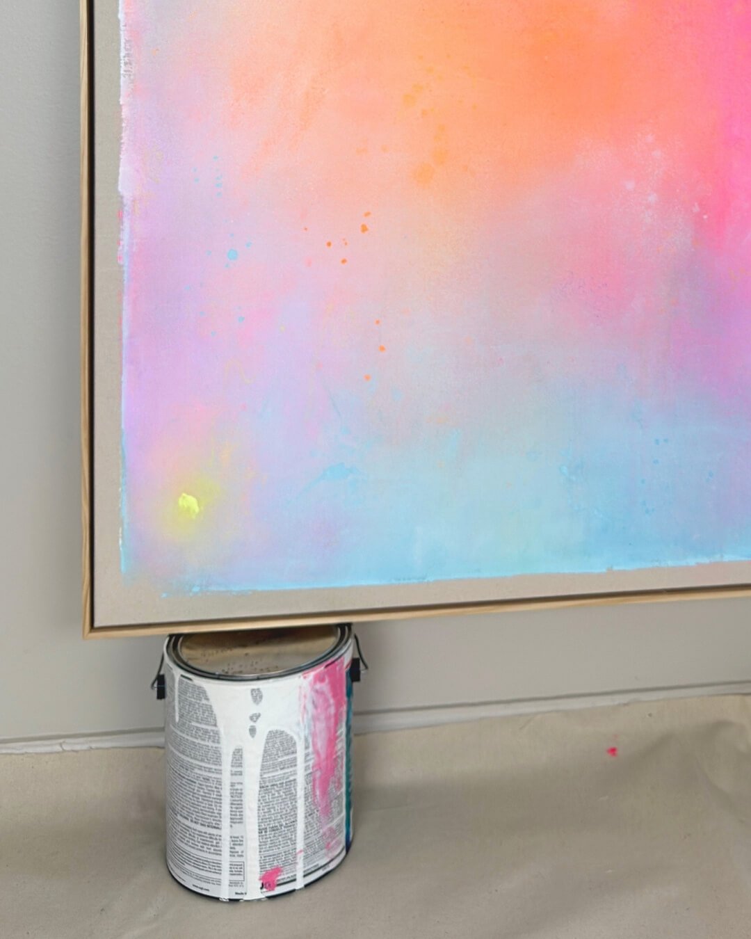 Close-up detail of smooth paint transitions and fluid color blending in warm pink, orange, and soft turquoise from Bloom in Waterlight by Vanessa Ochi