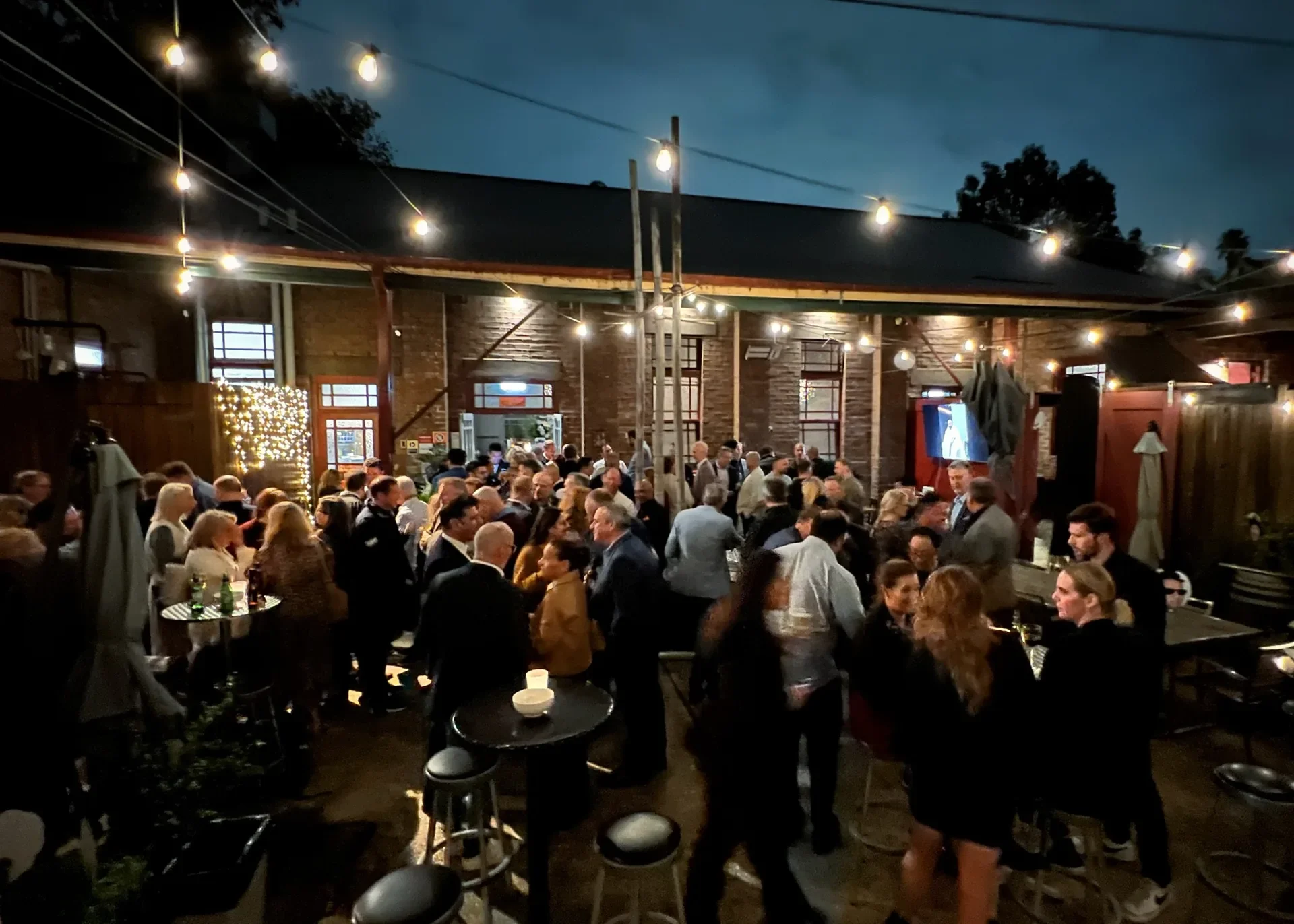 corporate event dinner restaurant booking with outdoor courtyard