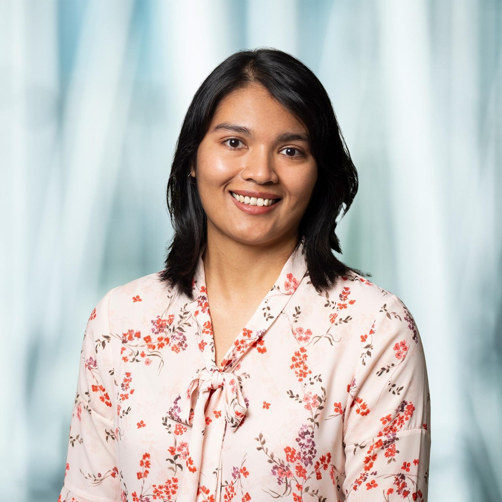 Michelle, founder and leadership consultant, smiling in a portrait photo introducing her approach to leadership and organisational development.