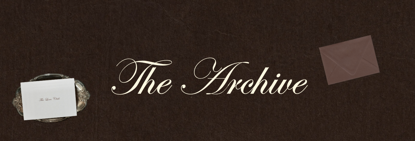 A sign with the text "The Archive" in elegant cursive font on a textured dark brown background, with crossed envelope graphics and a silver tray with papers on it.