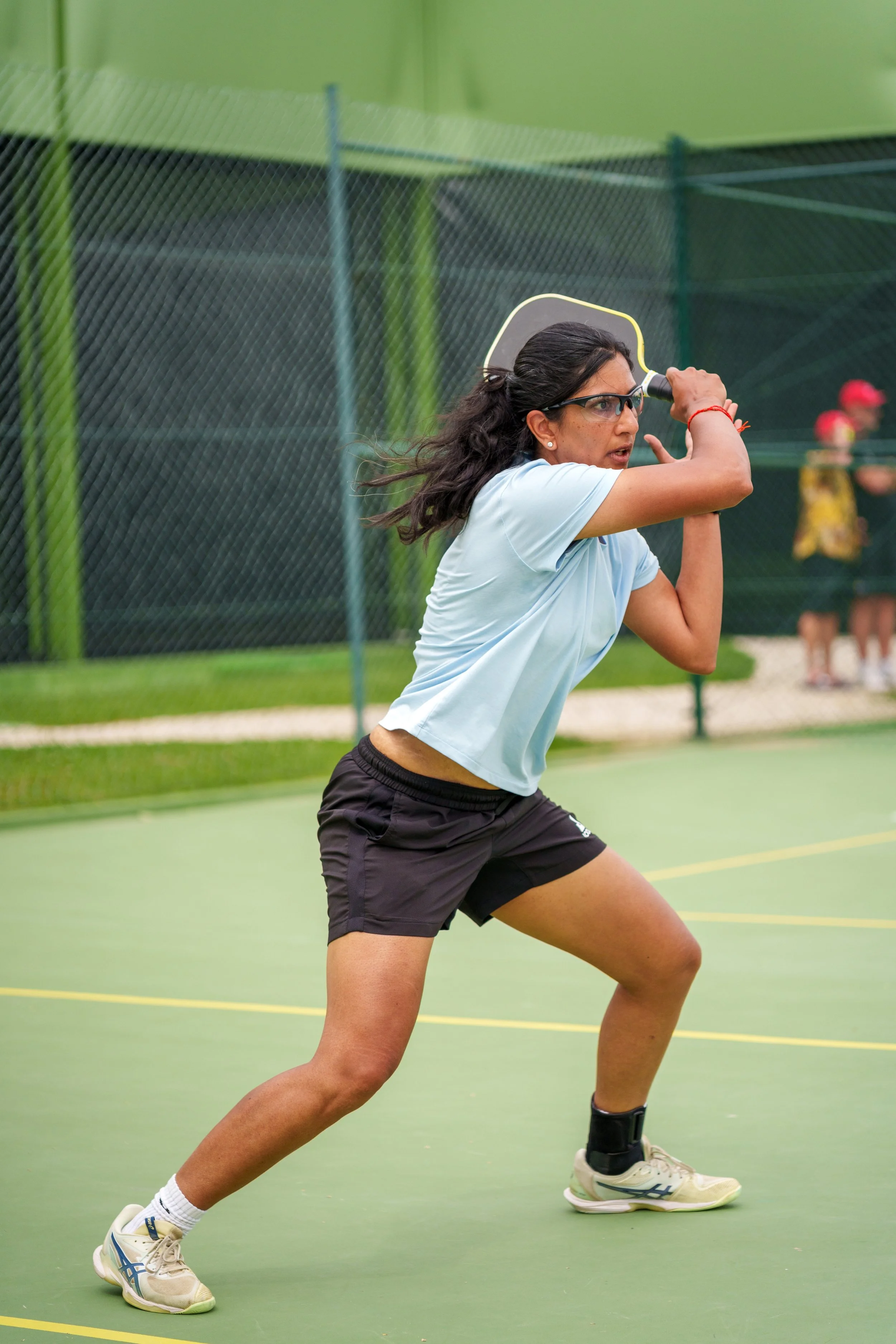 A player hitting a pickleball during the Lisboa Open