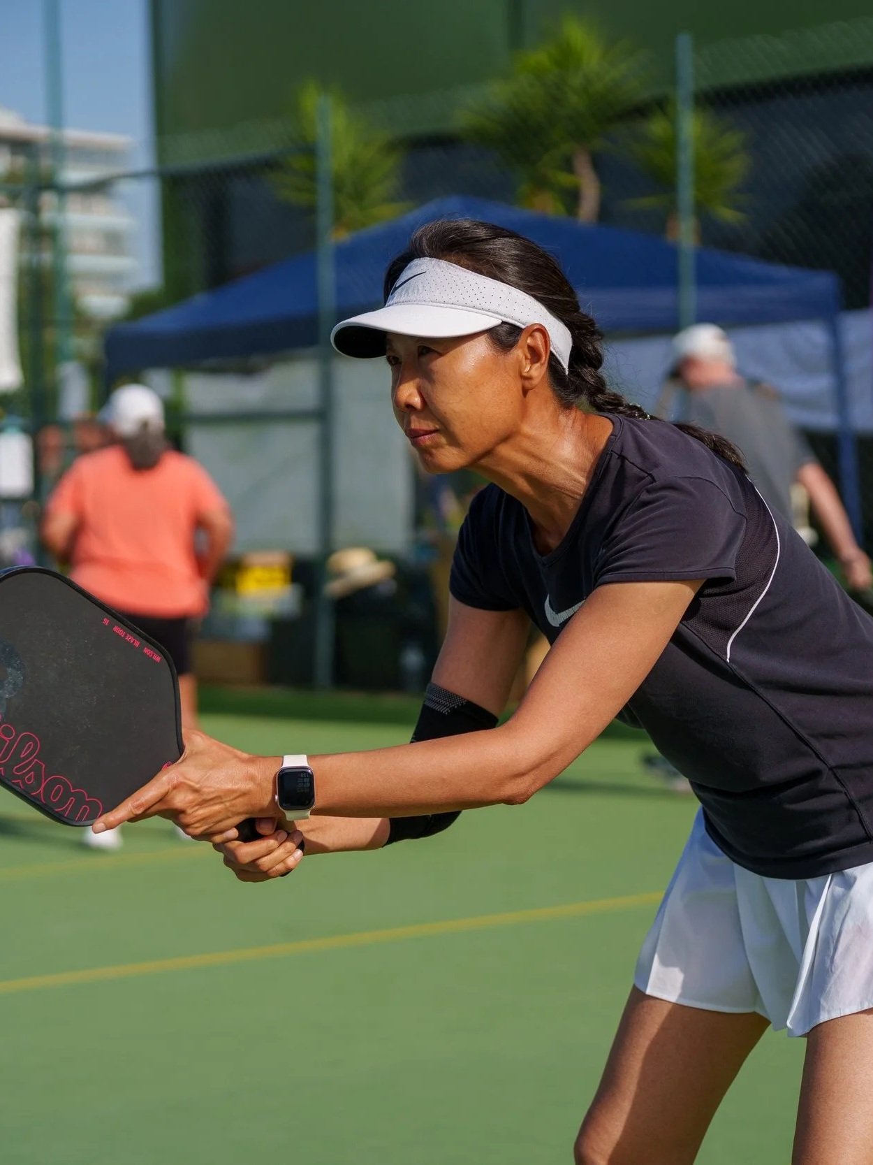 A player hitting a pickleball during the Lisboa Open