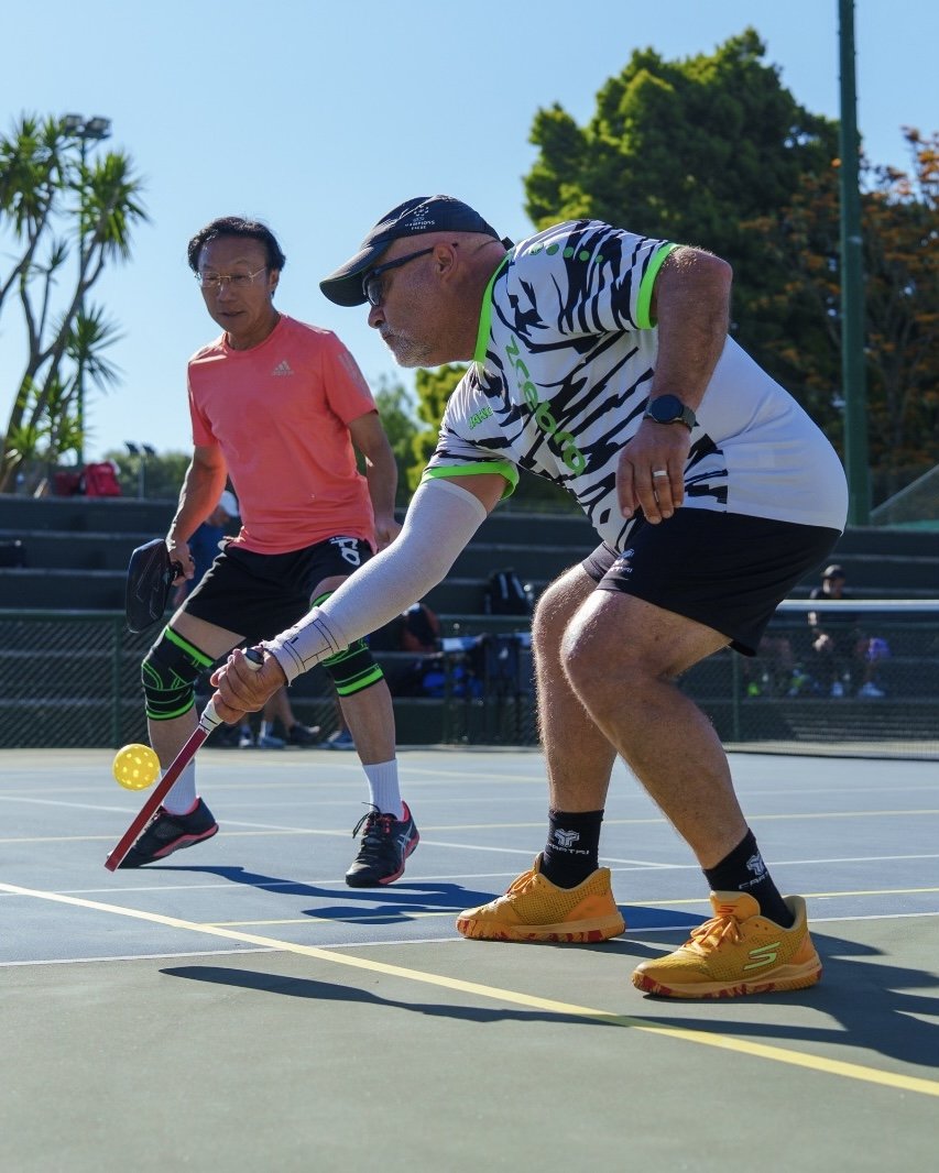 A player hitting a pickleball during the Lisboa Open