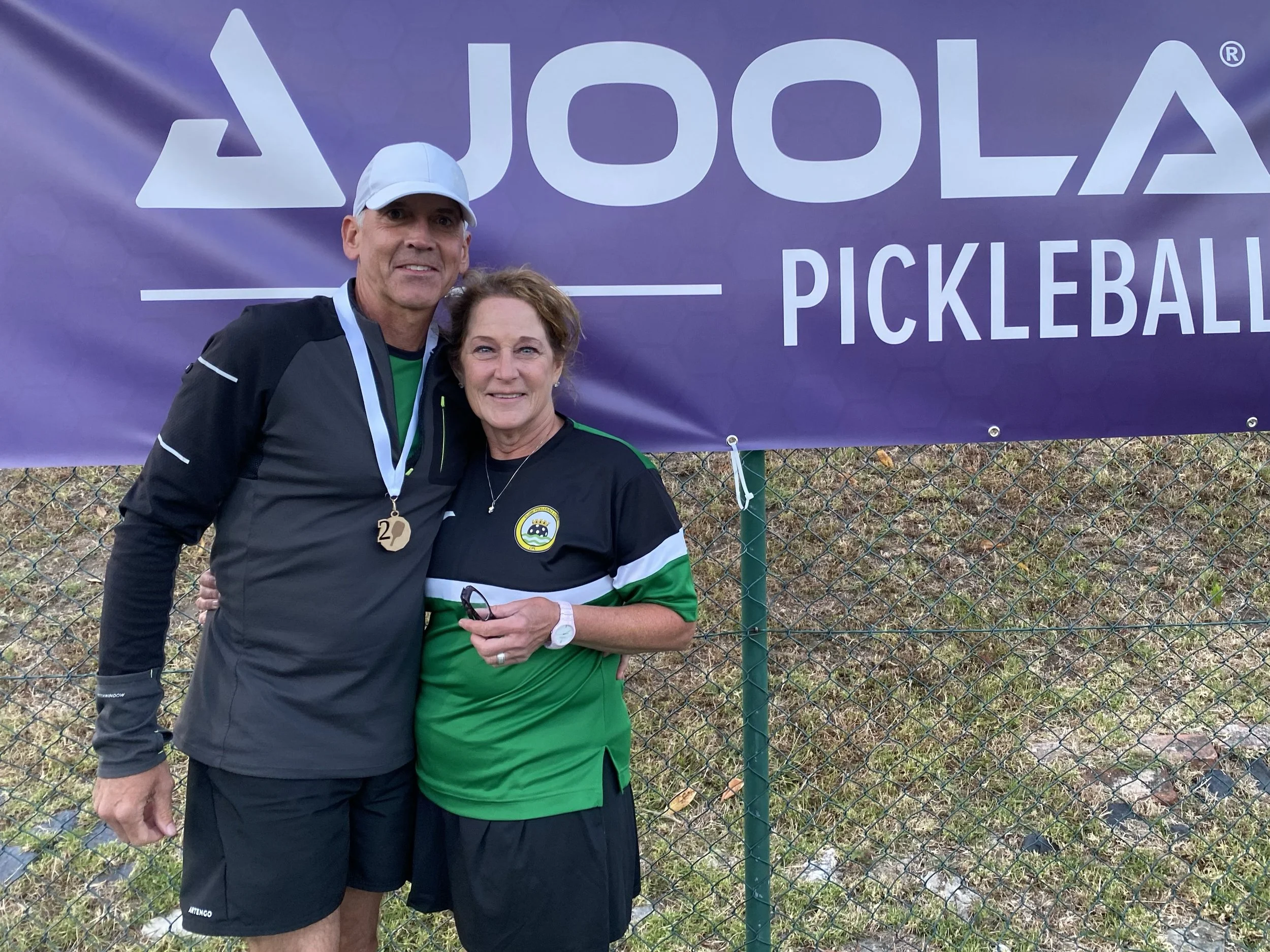 Joola pickleball sign behind the CPL founders in Lisbon