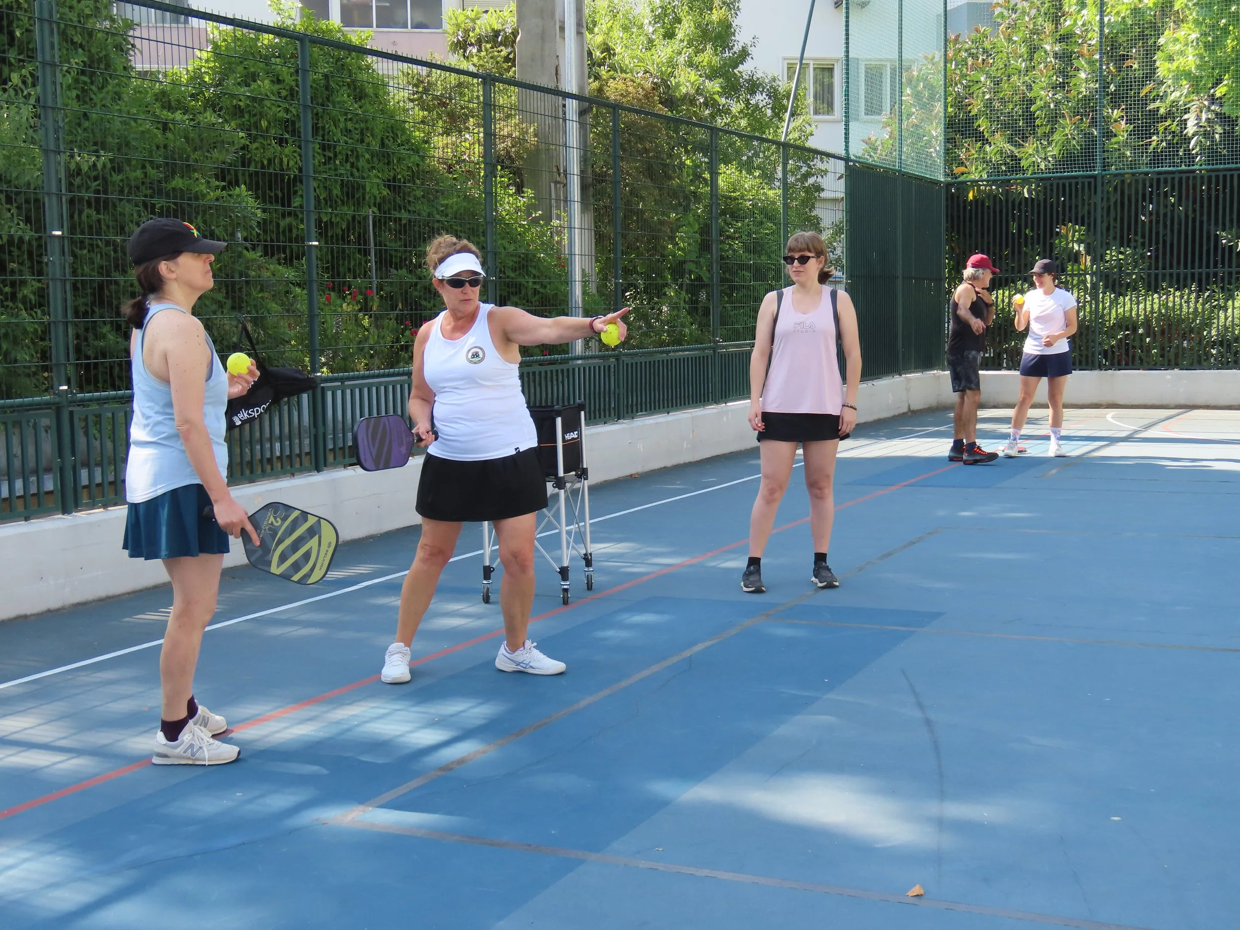 CPL Pickleball Academy class with a coach teaching pickleball players new skills.