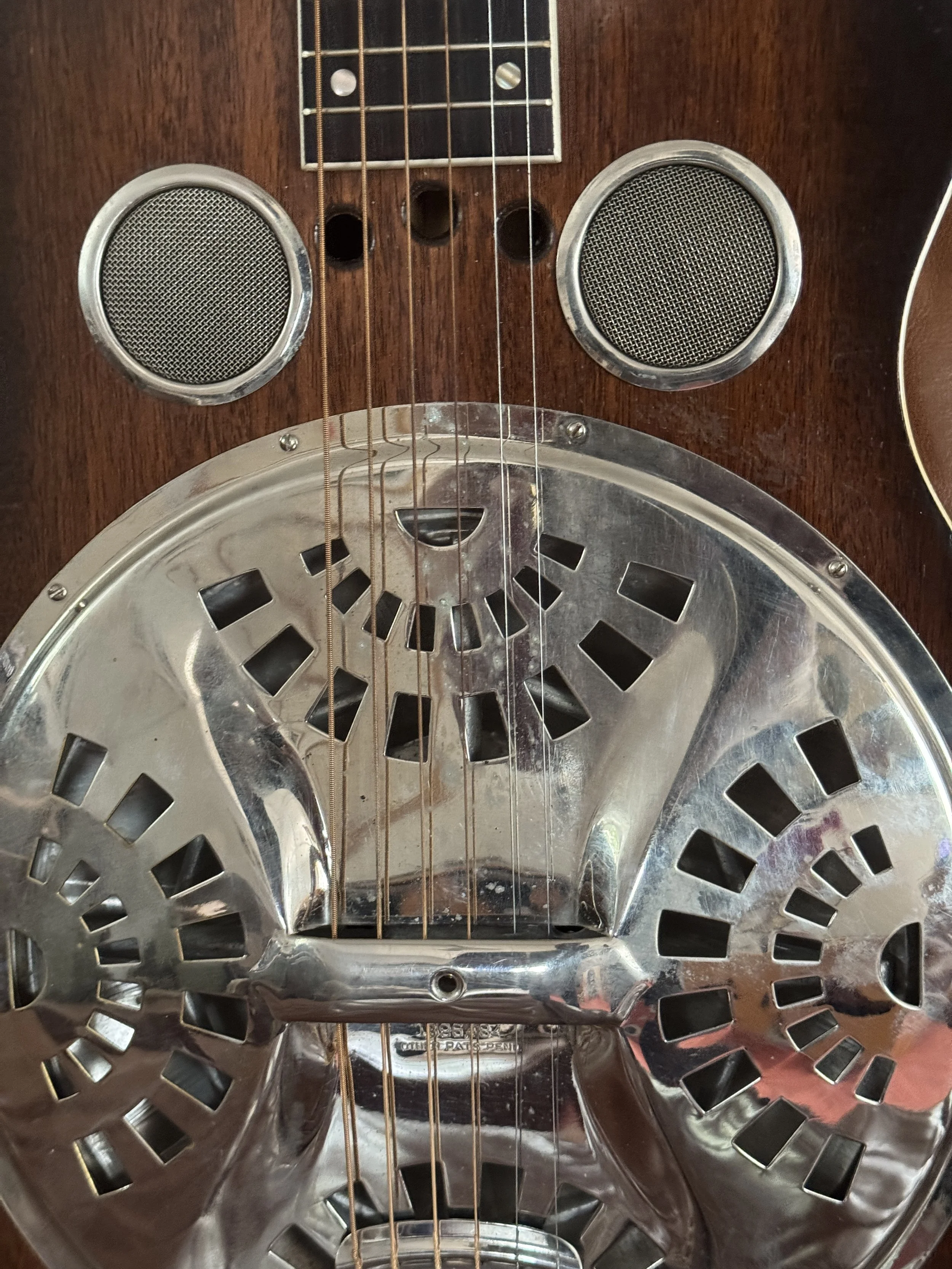 top resonator and additional smaller soundholes Dobro Model 37 , 1935