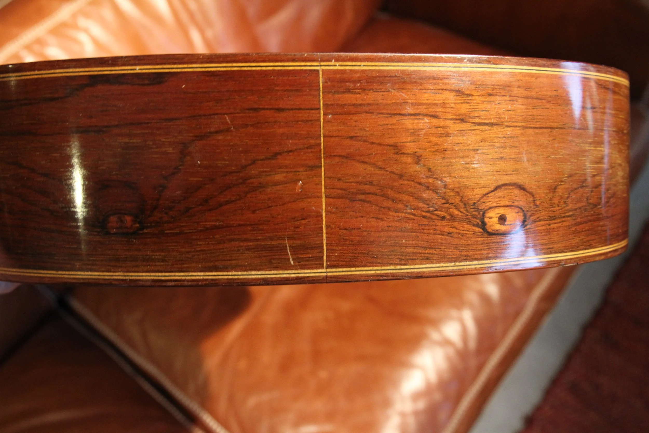 "cats eyes" on brazilian buttom of Manouk Papazzian guitar 1959,