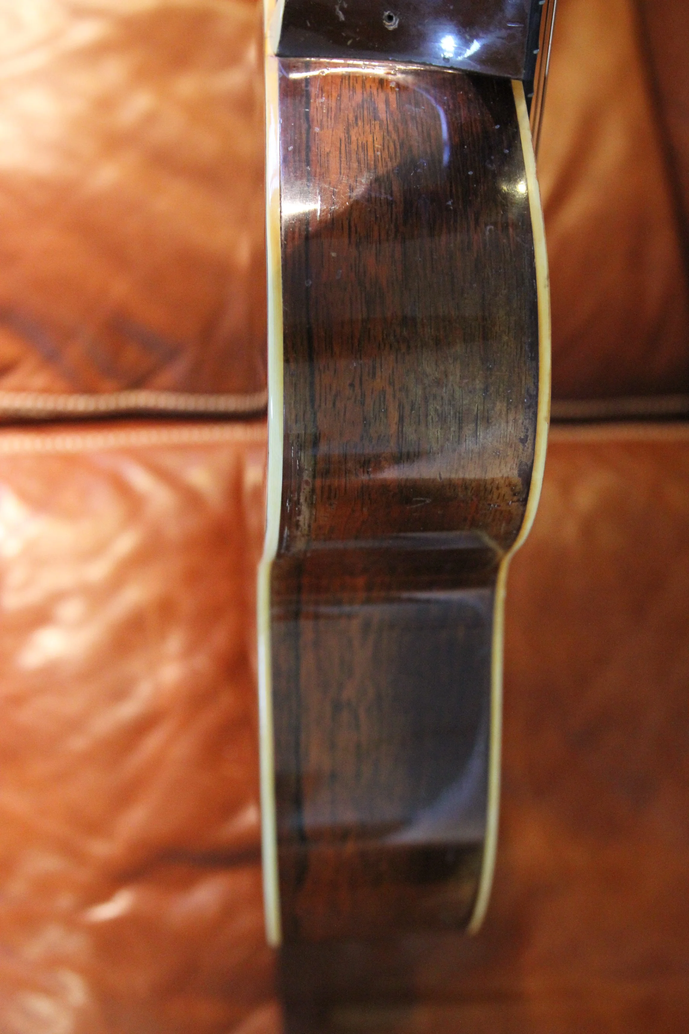 bass side and neck-joint of a prewar guitar