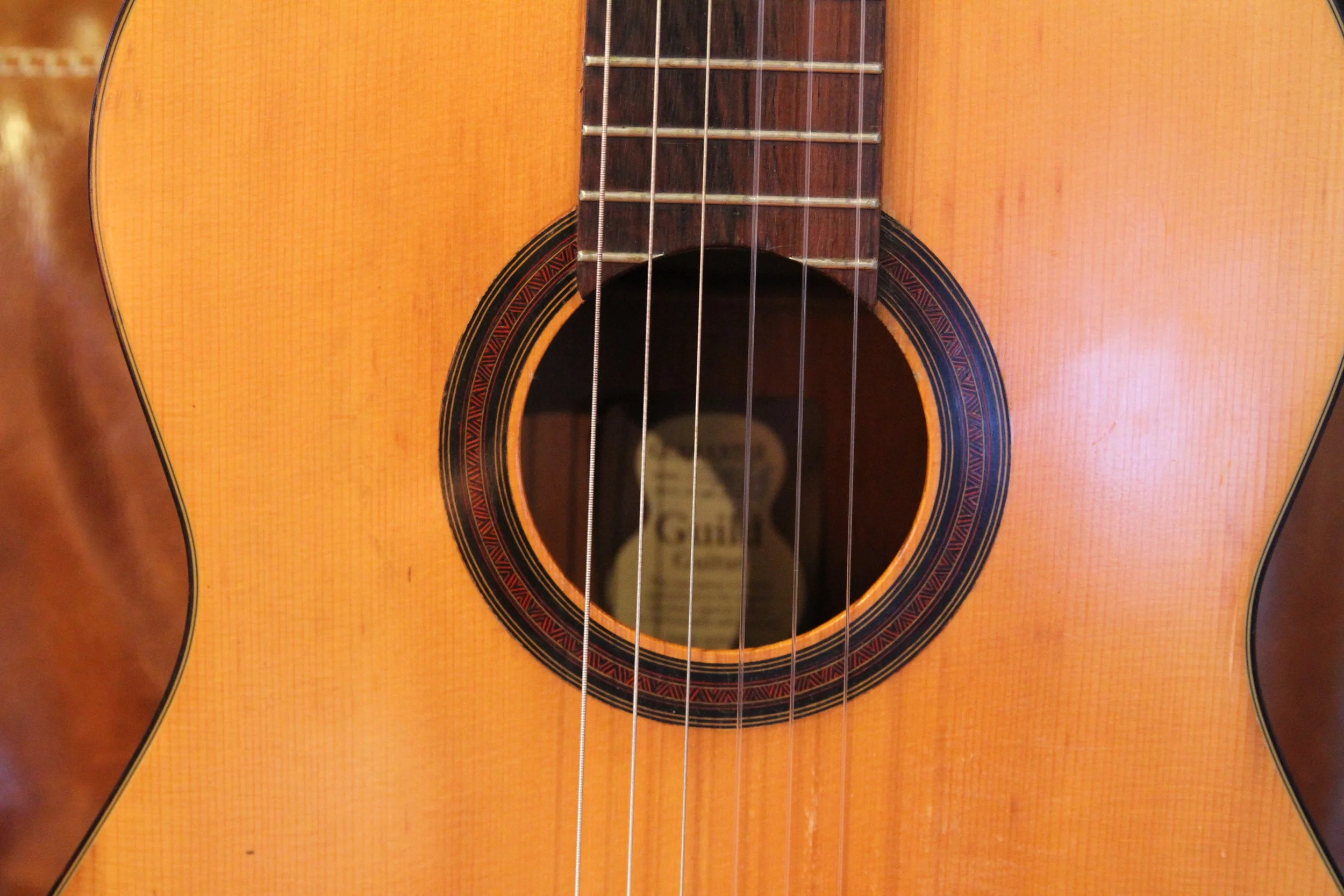 Close-up of Guild Mark II soundhole-ring marketry