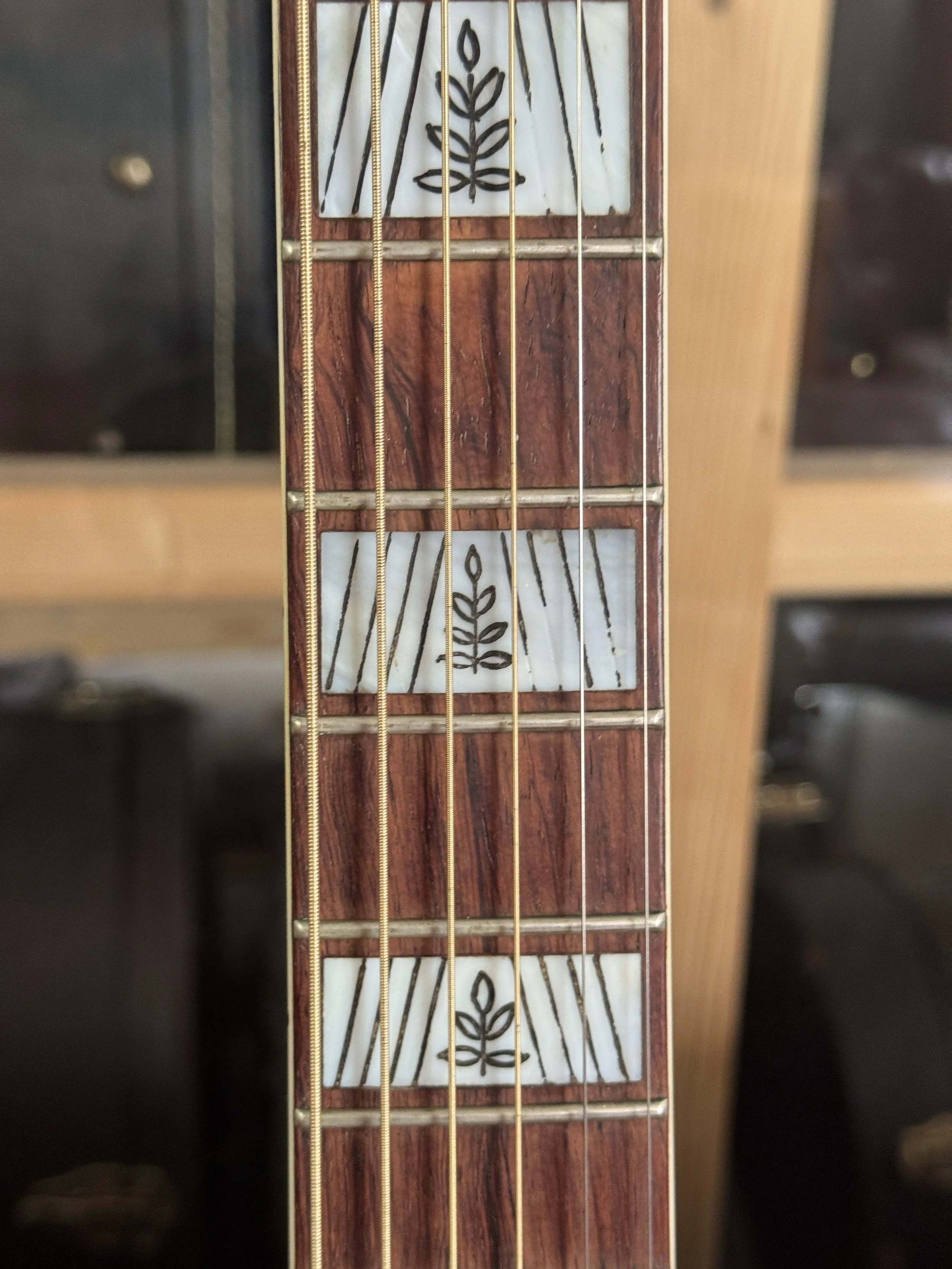 rosewood fretboard with ornamented block inlays Bronson Master Jumbo 1938