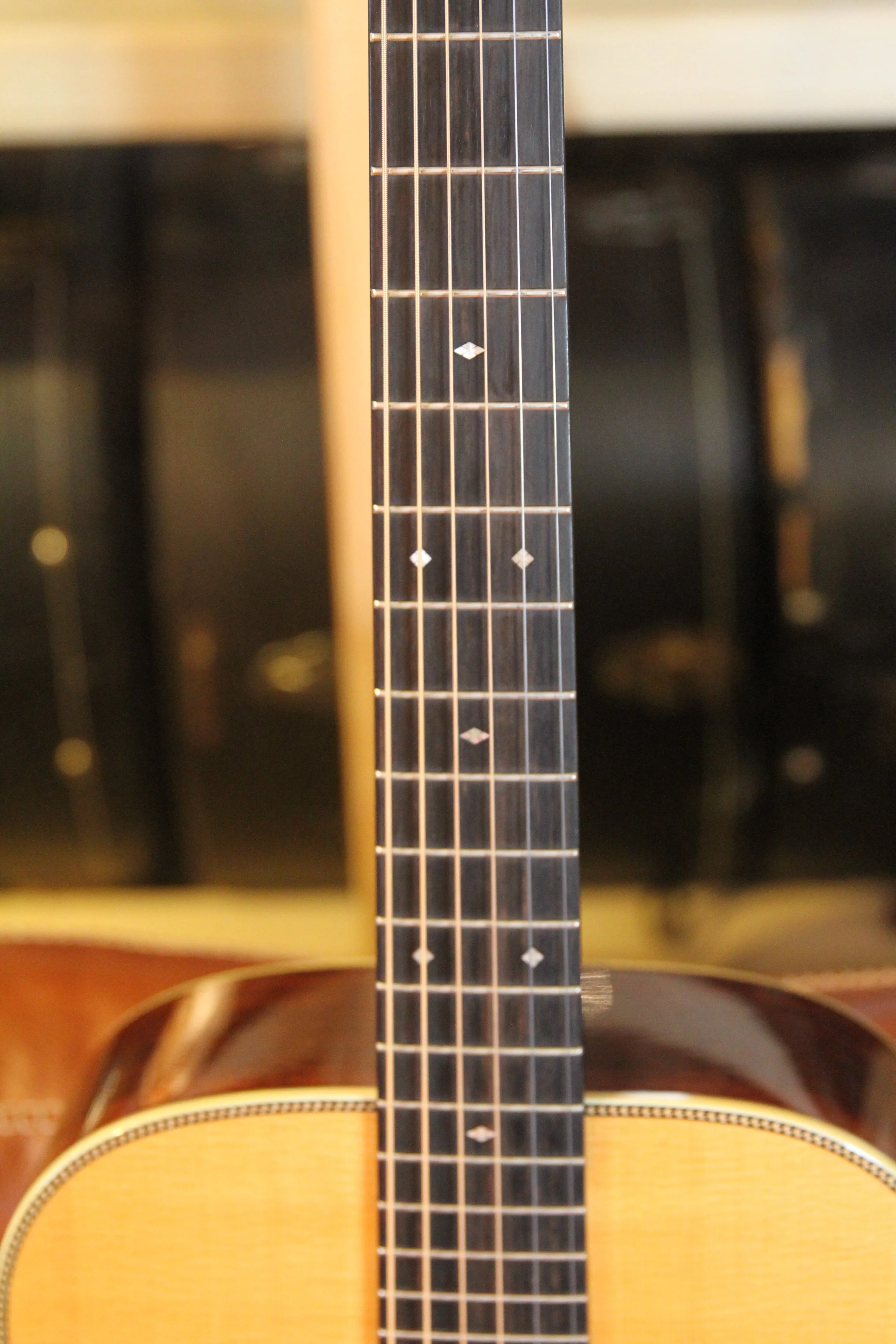 fretboard with diamond and snowflake inlays, herringbone top purfling Santa Cruz D