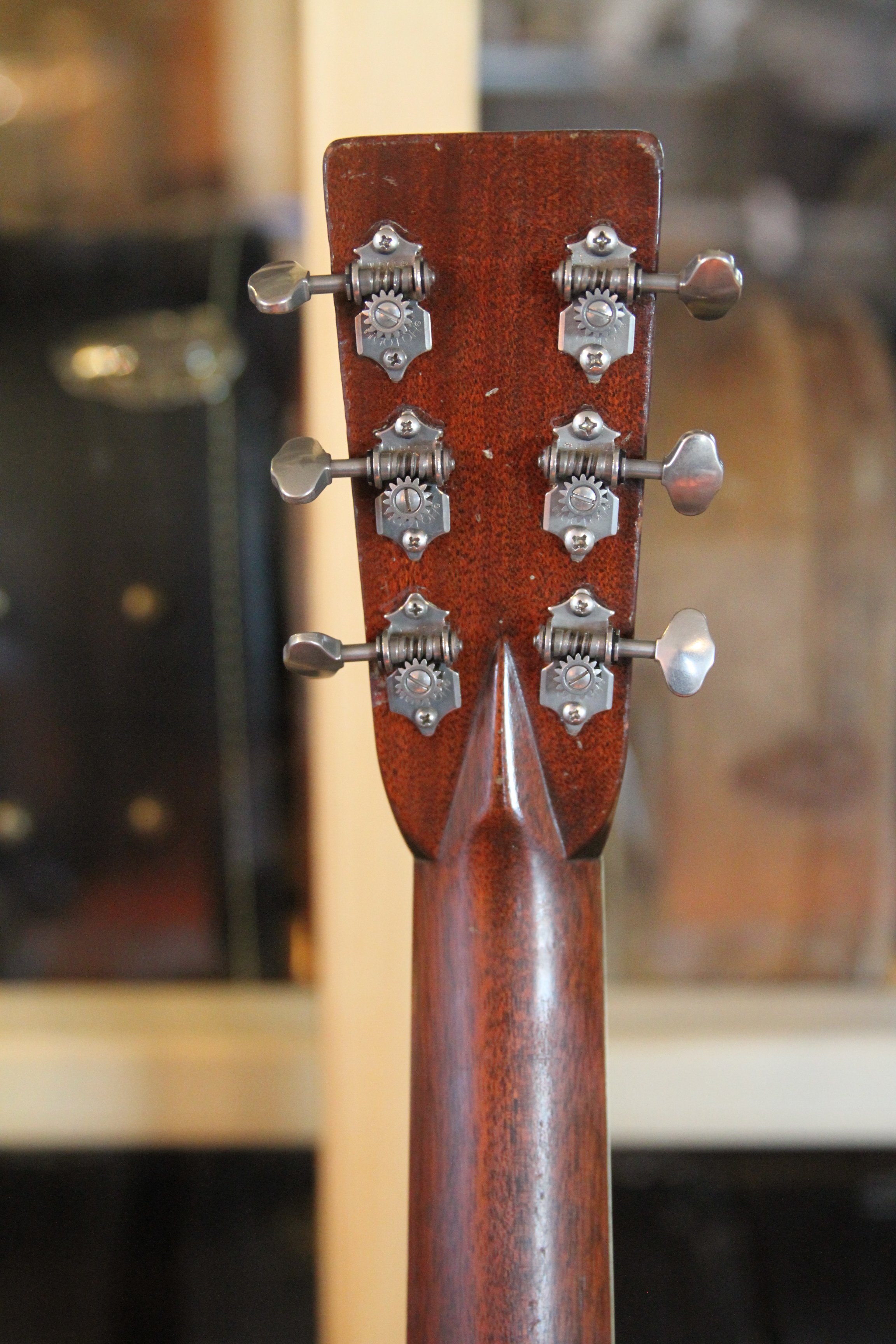 Close-up of a Martin guitar headstock back with old tuning pegs