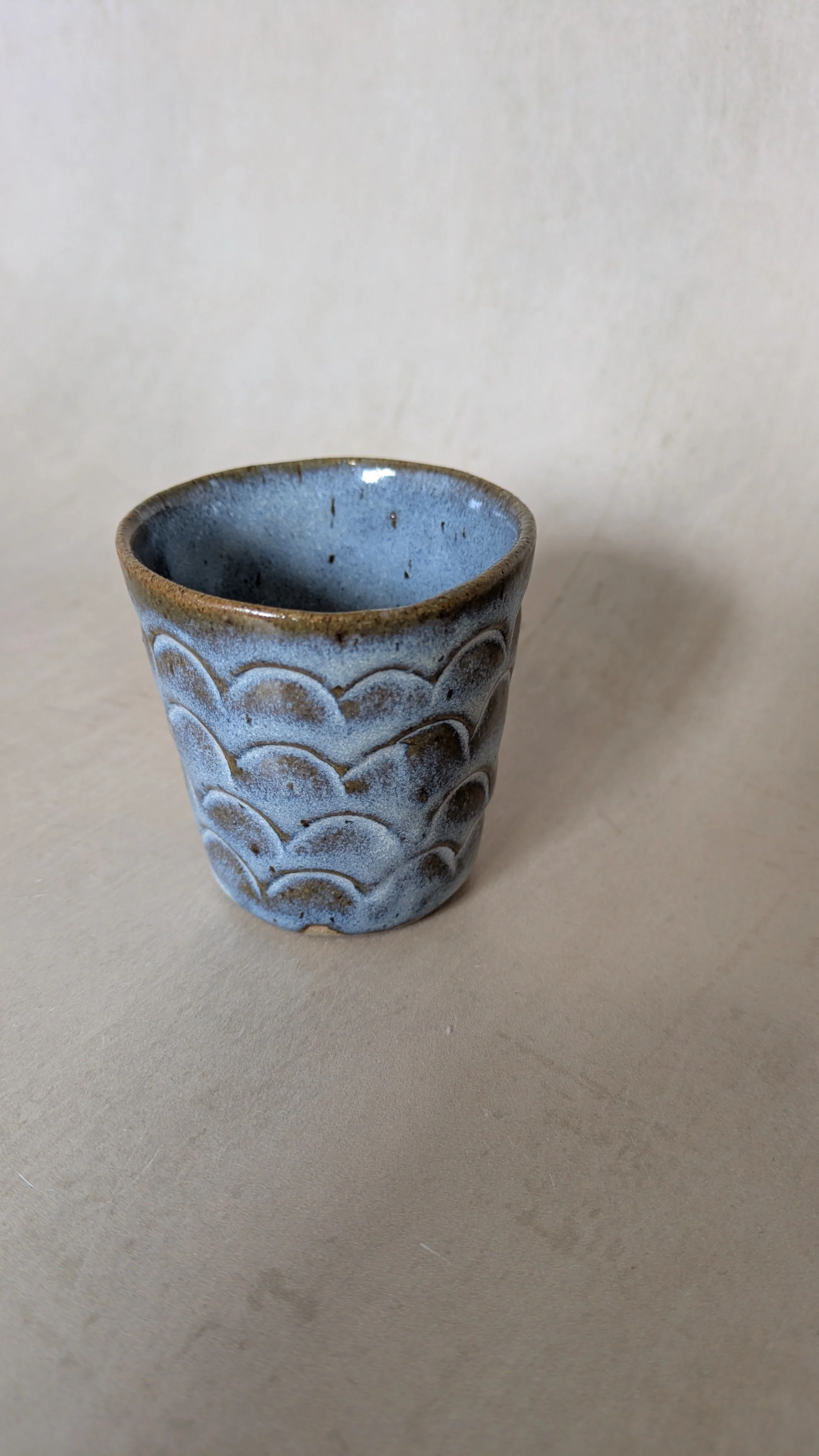 close-up-of-little-blue-cup-with-arch-texture.jpg.jpg