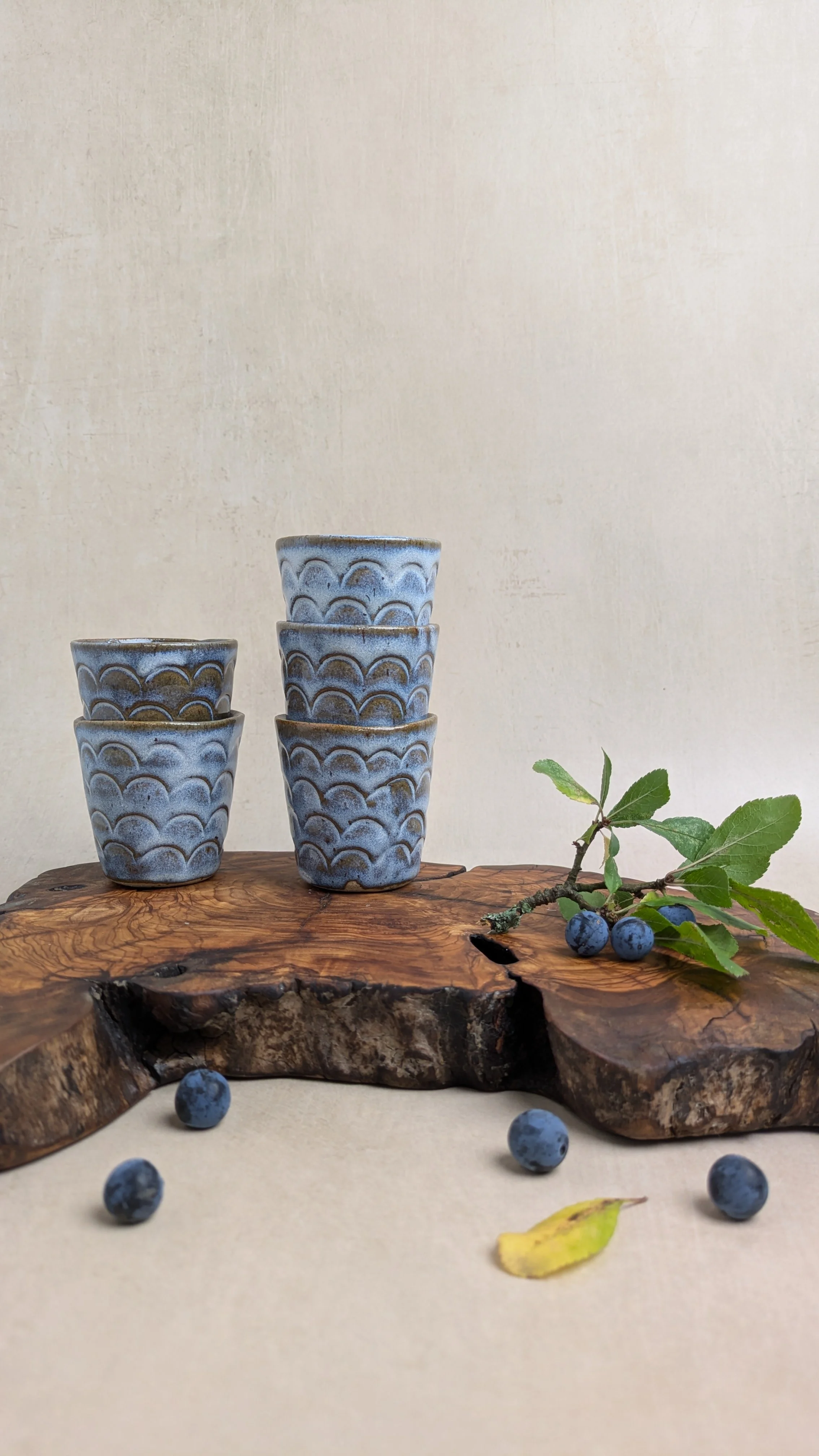 stacked-little-cups-in-blue-glaze-with-sloe.jpg.jpg